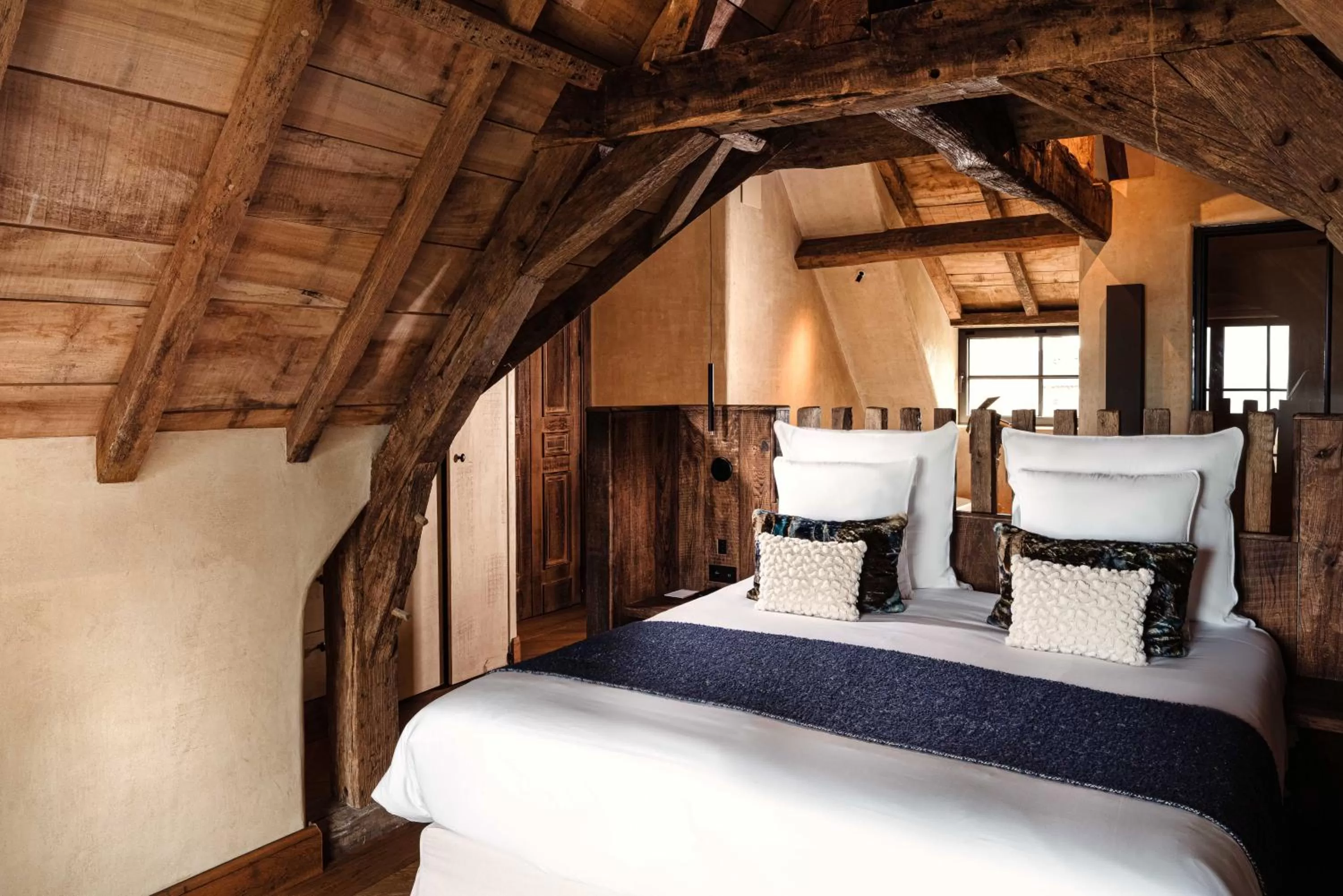 Bed in La Ferme Saint Simeon Hotel & Spa - Relais & Chateaux