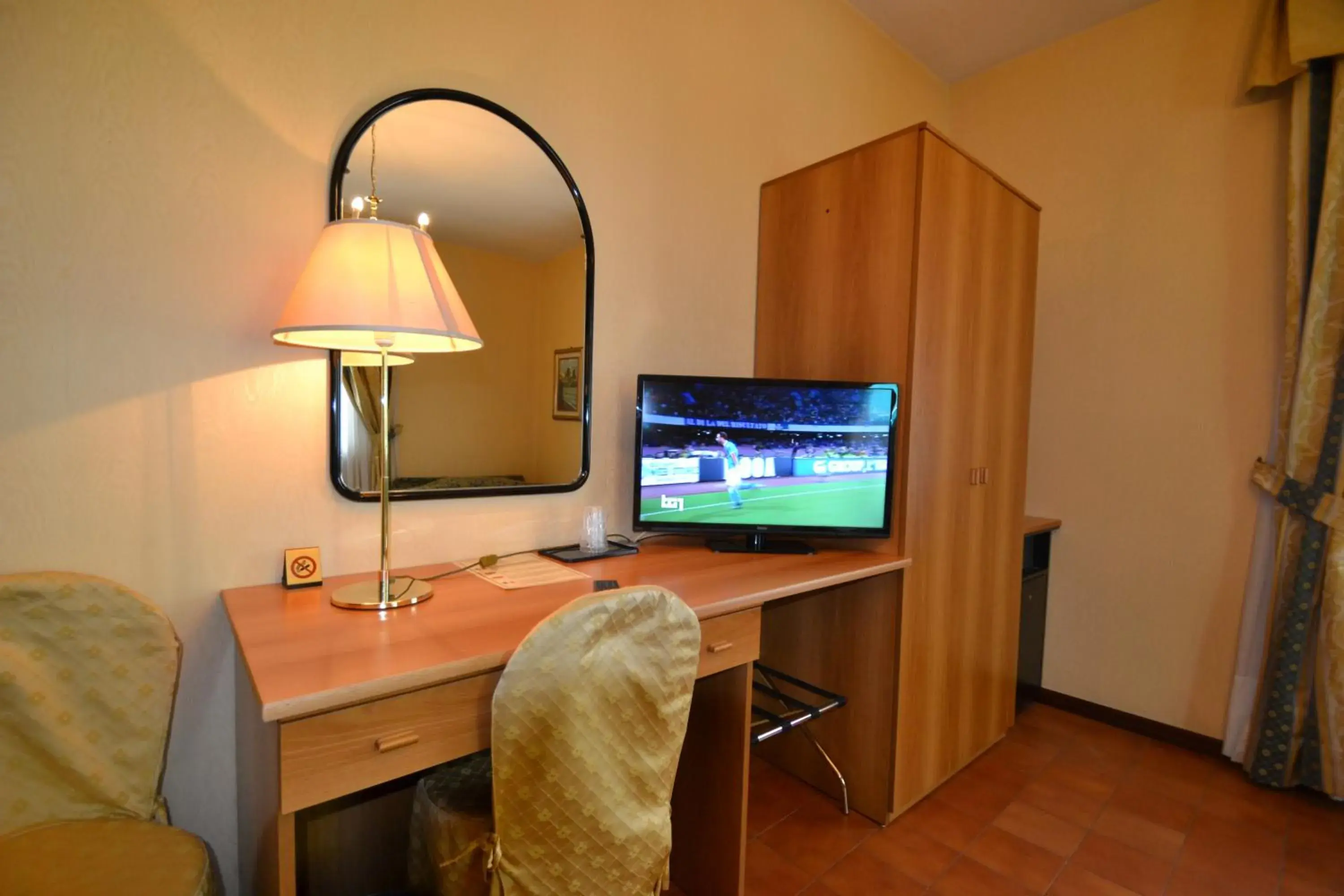 Photo of the whole room, TV/Entertainment Center in Hotel Residence