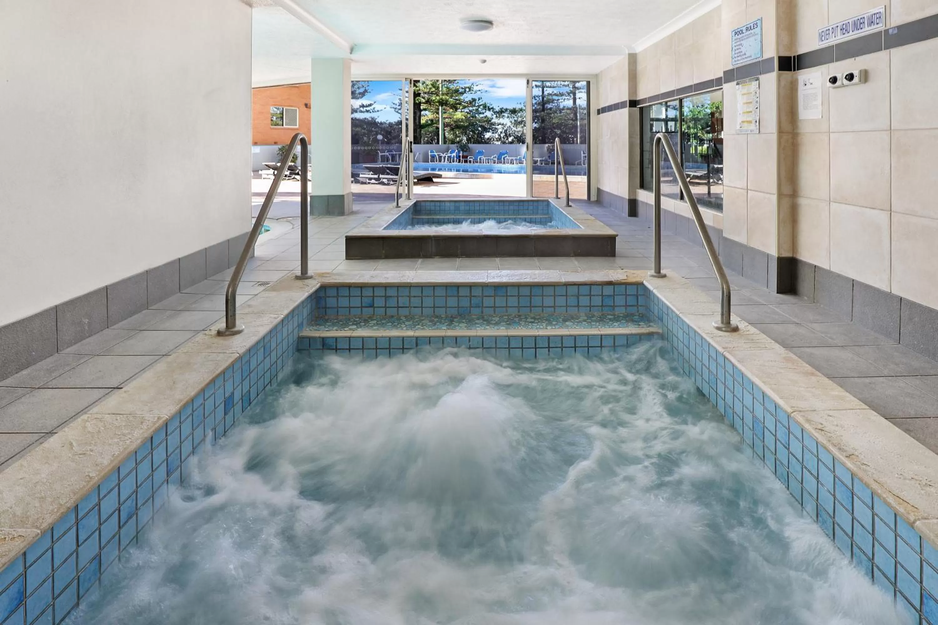 Hot Tub in Pacific Regis Beachfront Holiday Apartments
