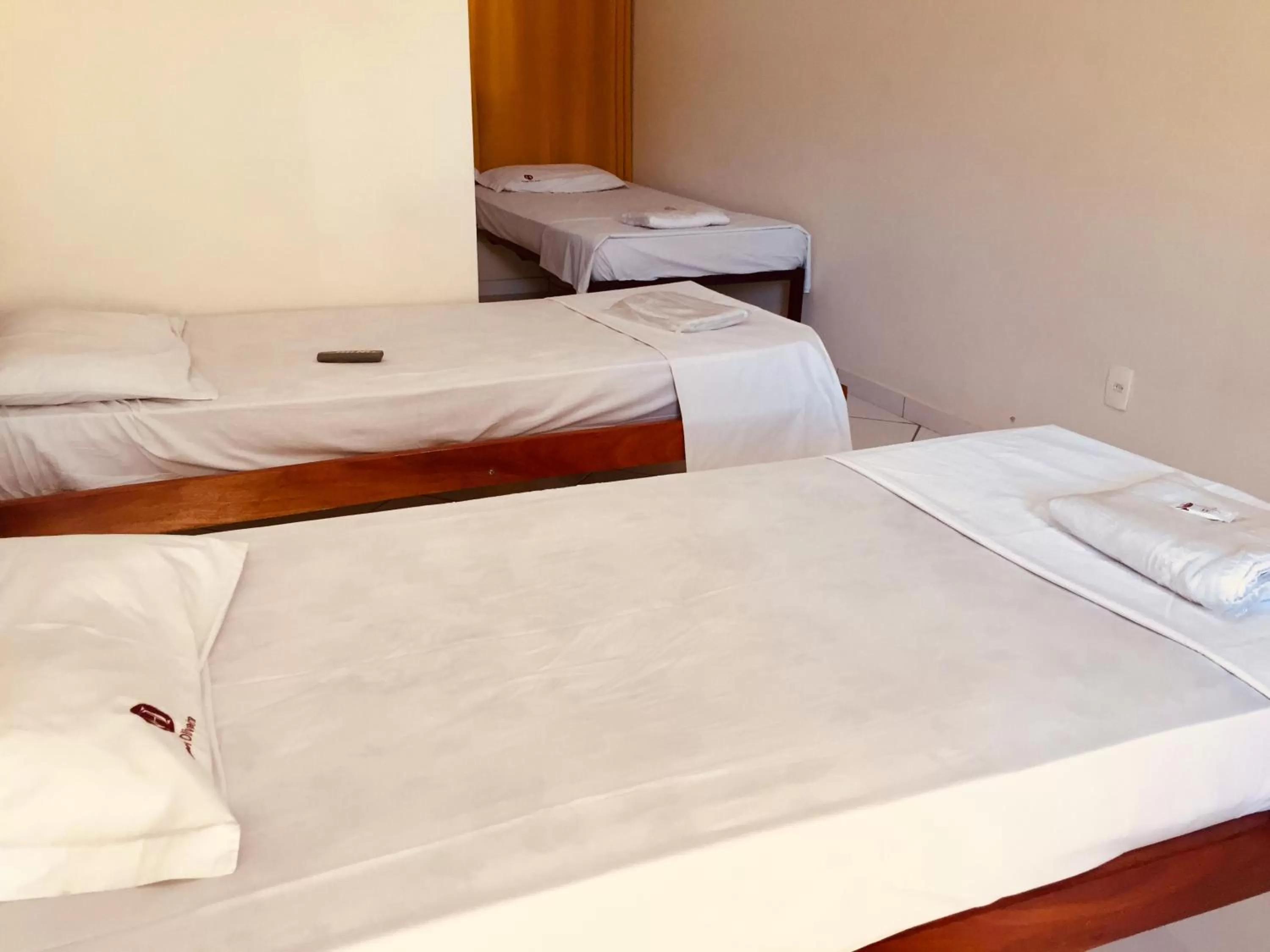 Bed in Hotel Oliveira