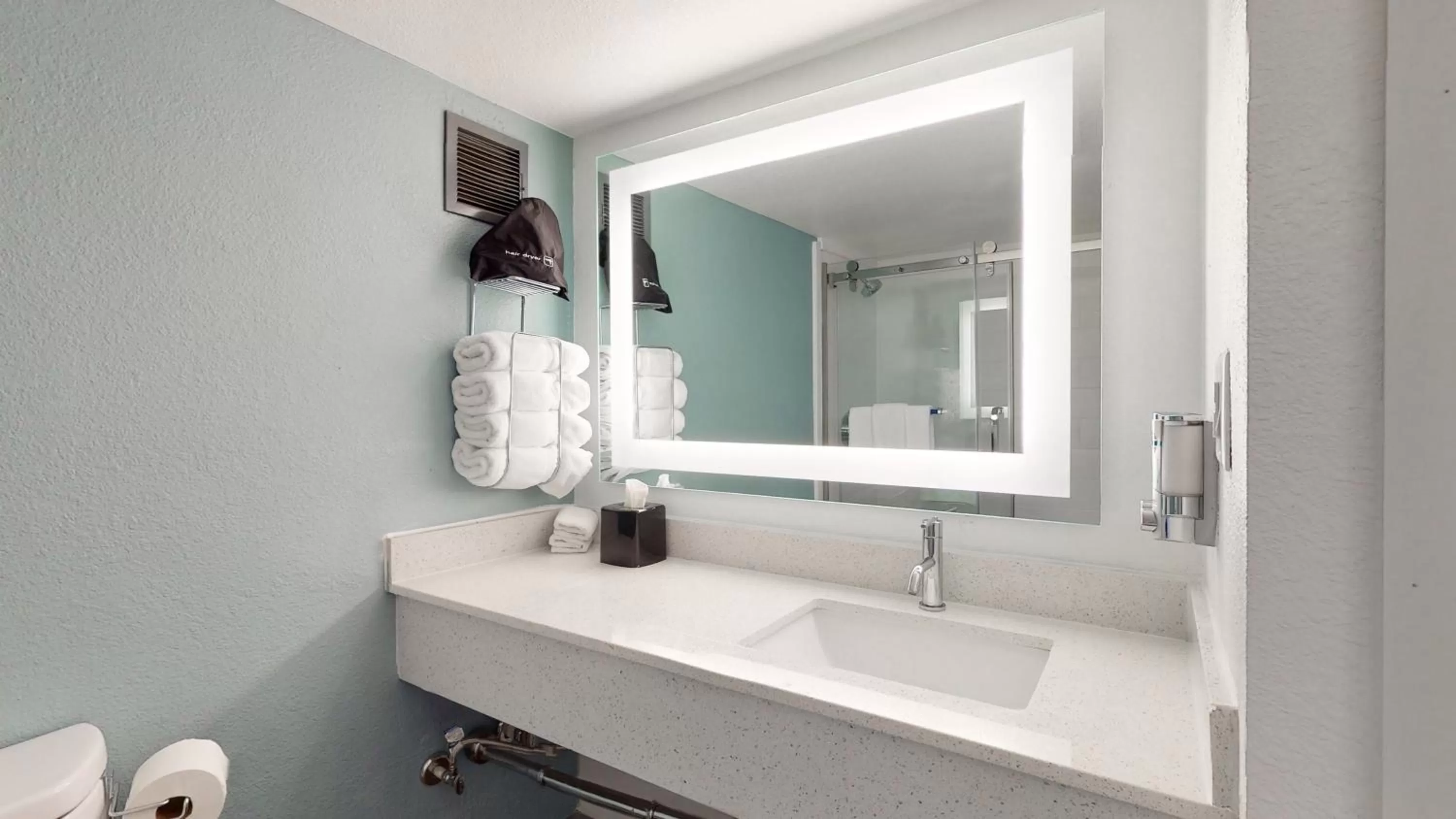 Bathroom in voco College Station Aggieland by IHG