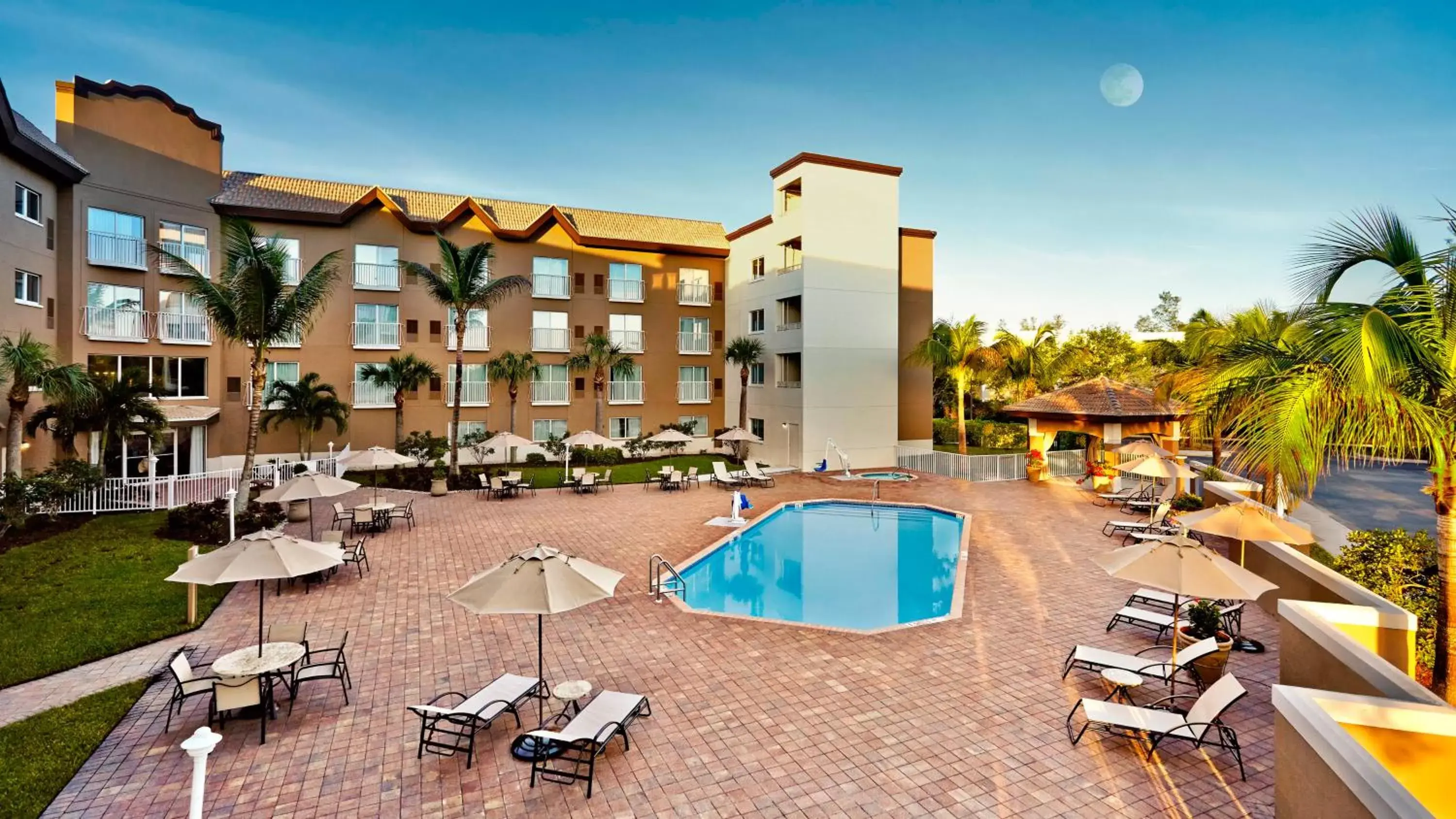 Swimming Pool in Holiday Inn Express & Suites Naples Downtown - 5th Avenue, an IHG Hotel