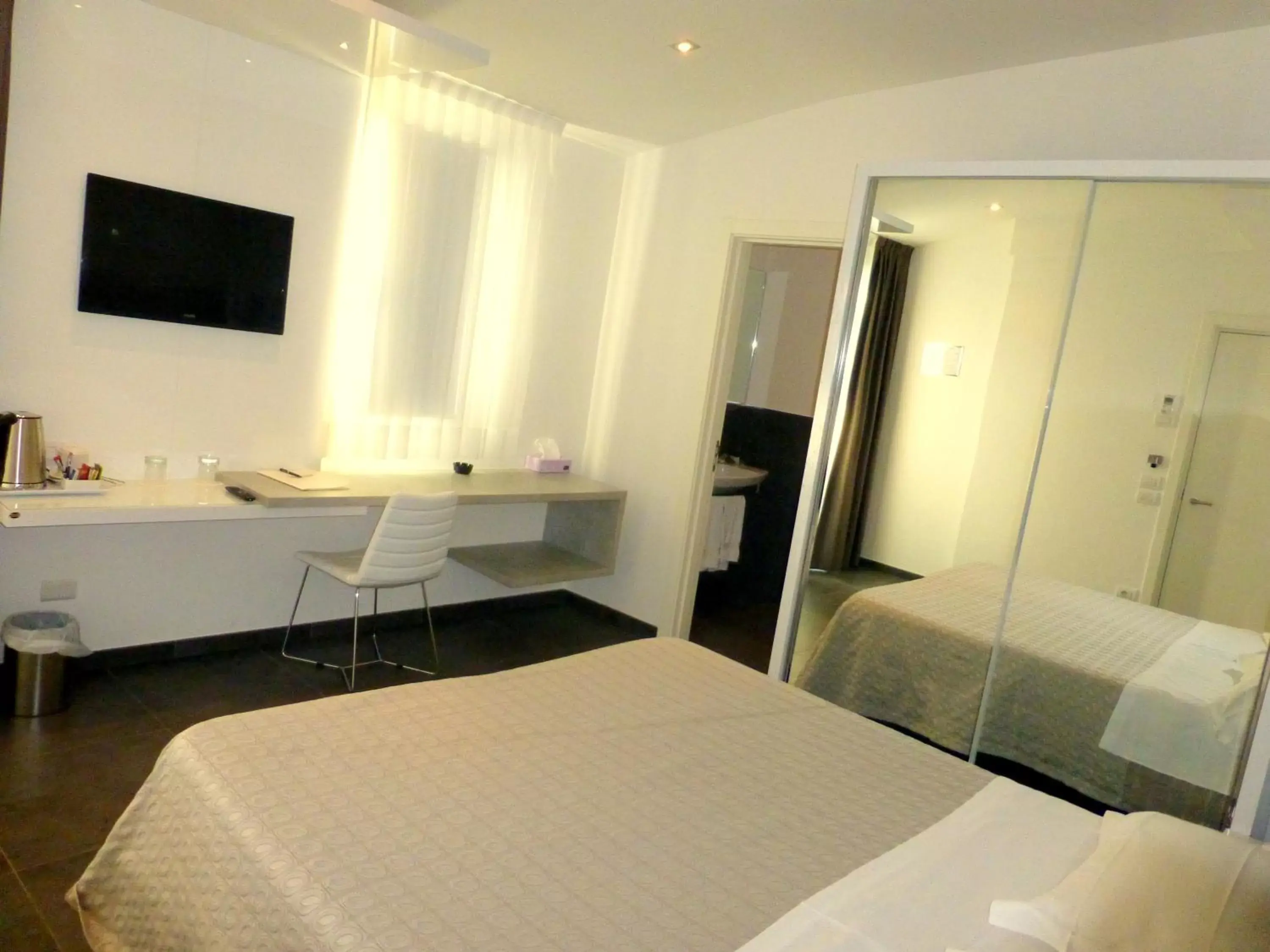 TV and multimedia, Bed in Baldinini Hotel
