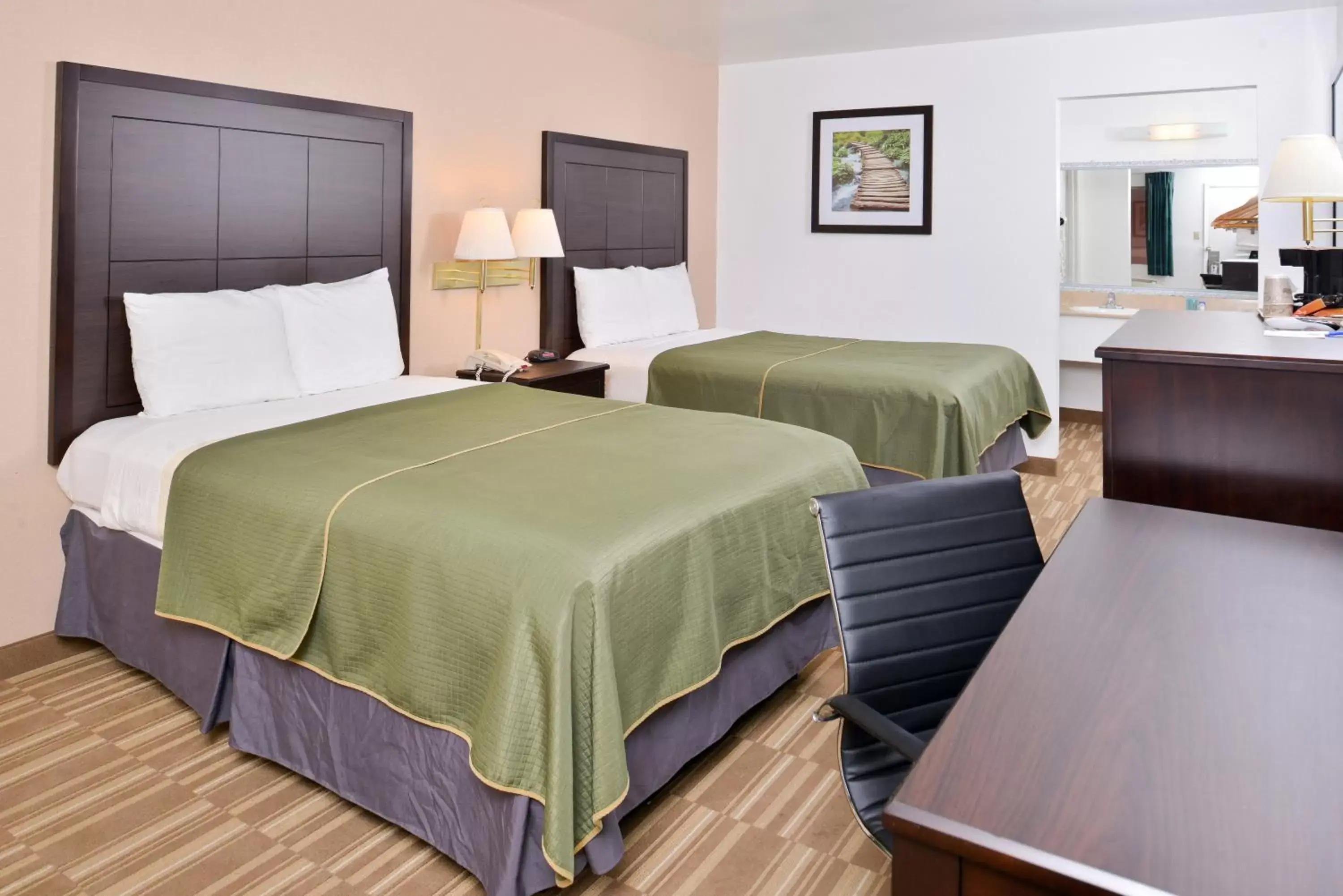 Bedroom, Bed in Americas Best Value Inn Clute