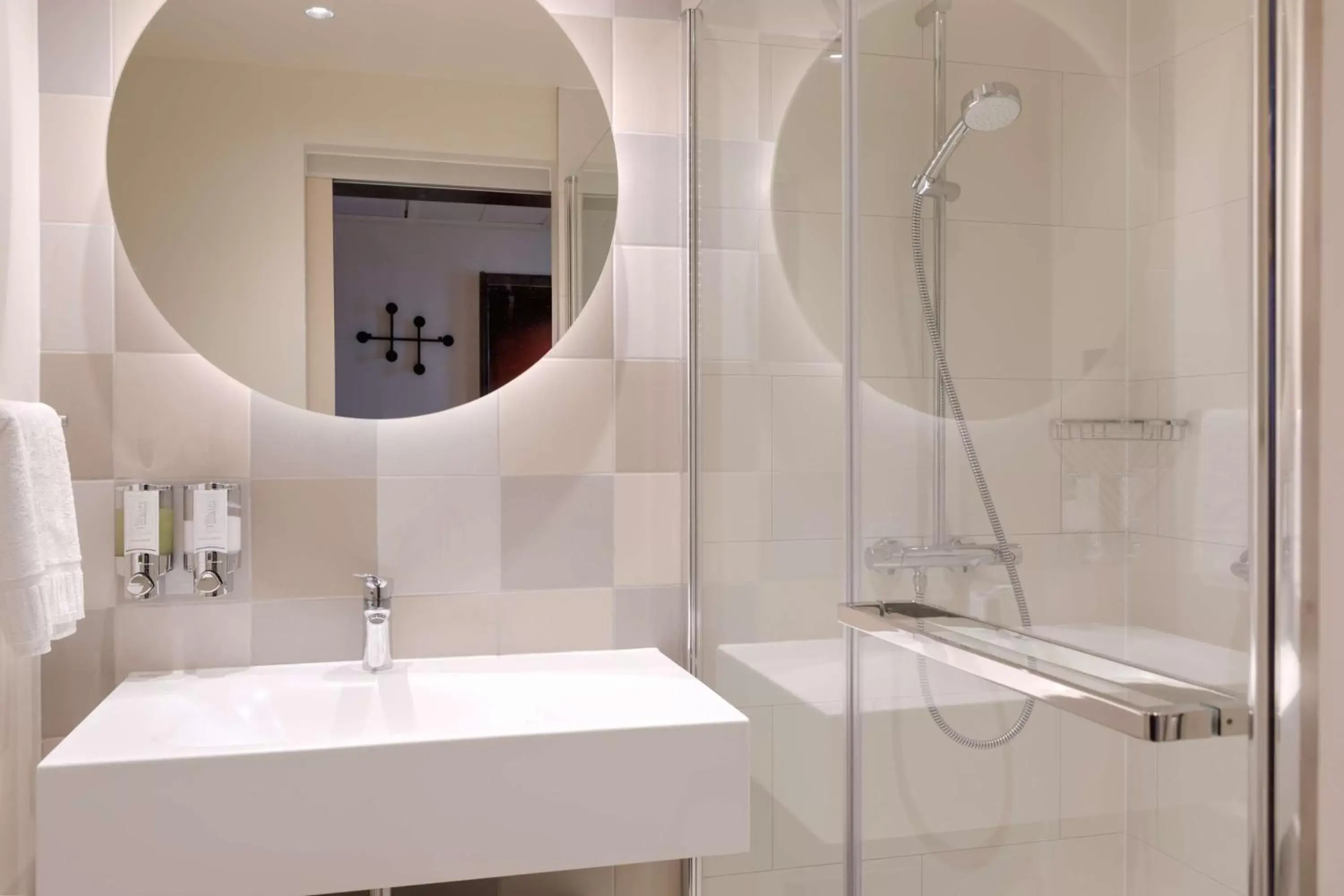 Bathroom in Hampton by Hilton Ashford International