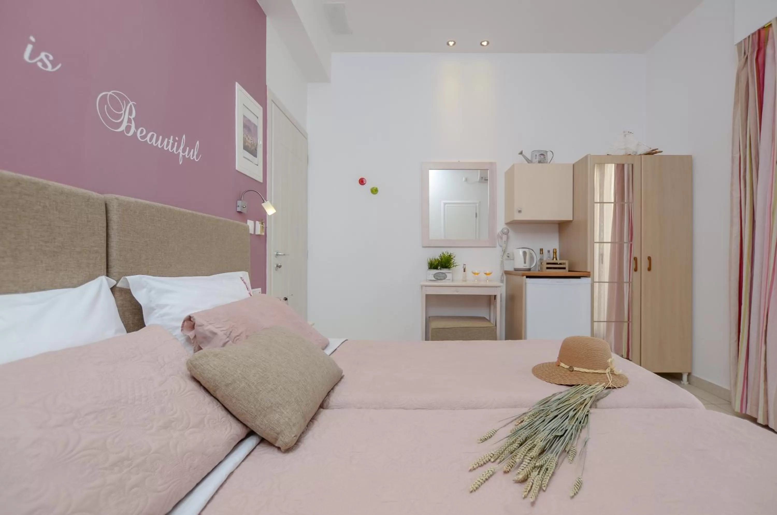 Bed in Panormos Hotel and Studios