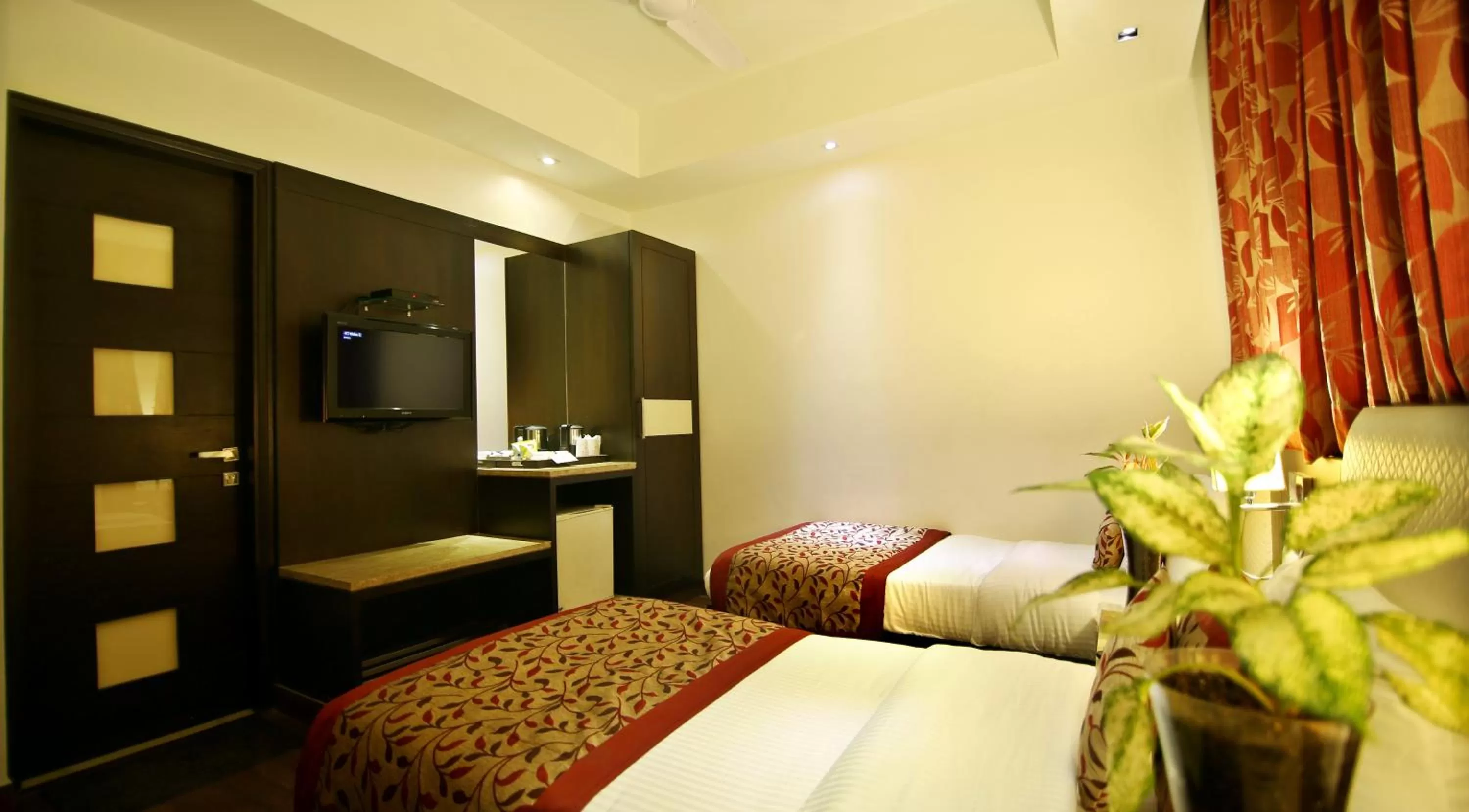 Bed in Hotel The Prime Balaji Deluxe, City Centre, With Free Airport Pickup