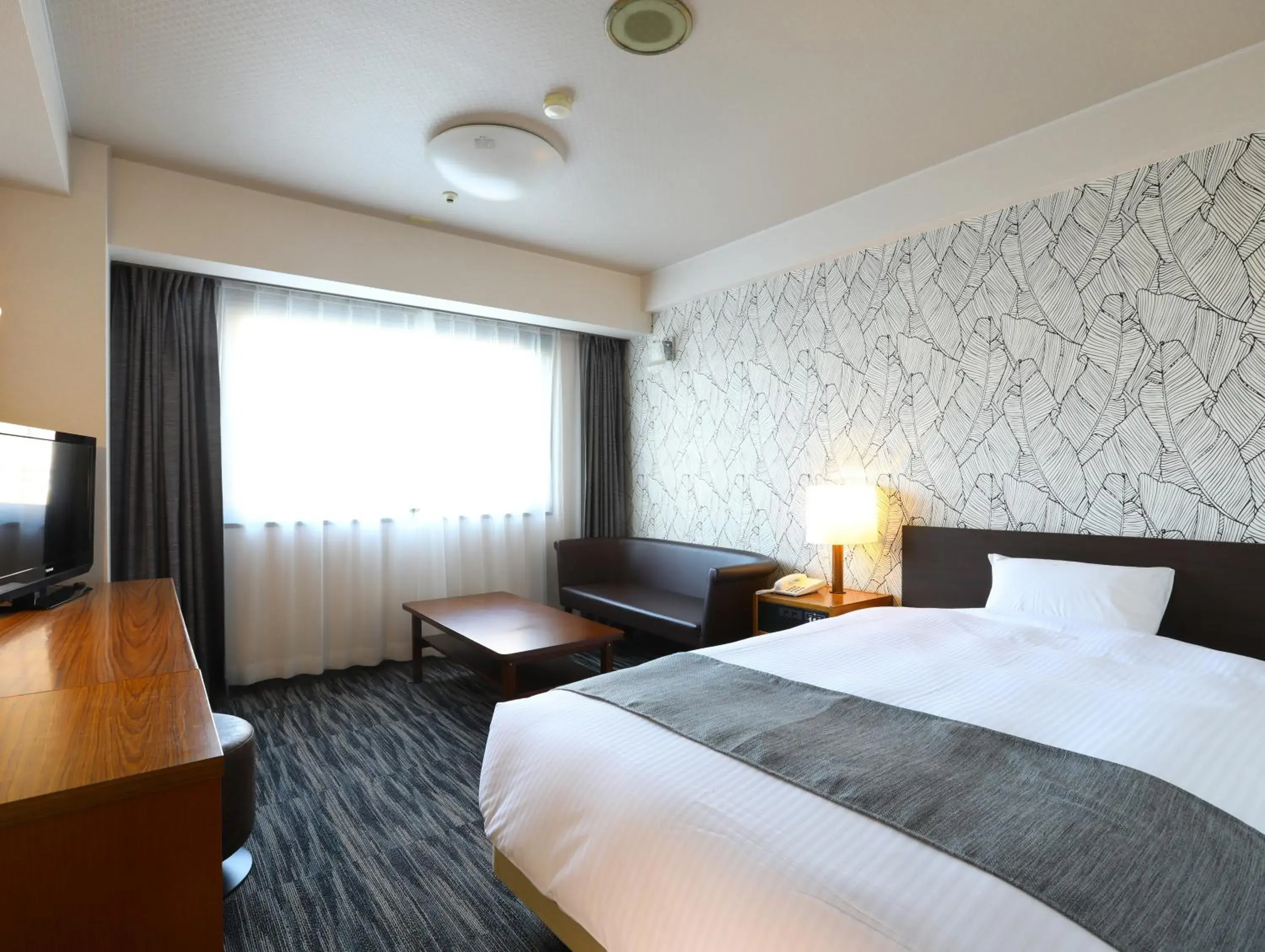 Bedroom, Bed in Hachinohe Grand Hotel