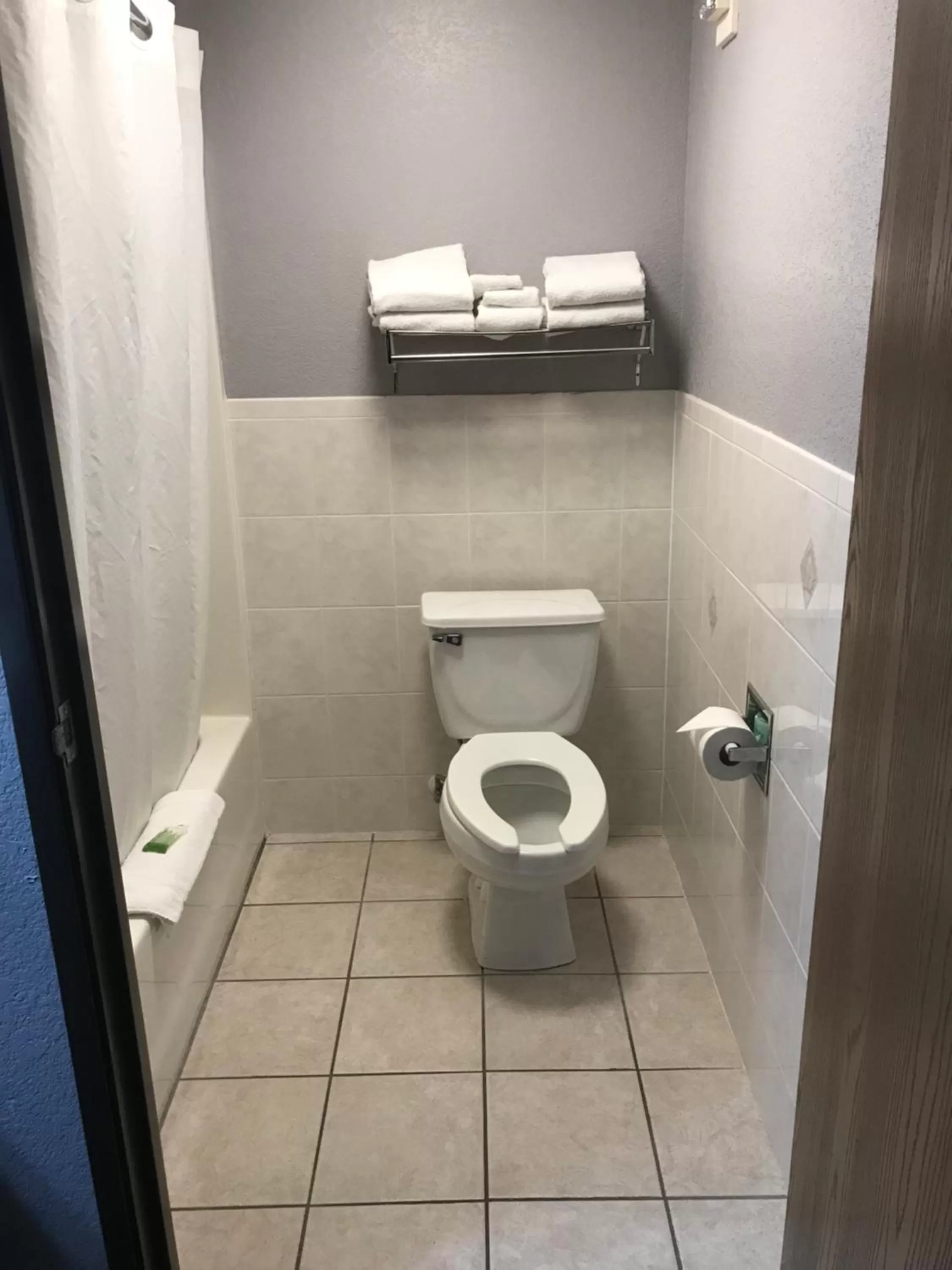 Bathroom in AmericInn by Wyndham Ankeny/Des Moines