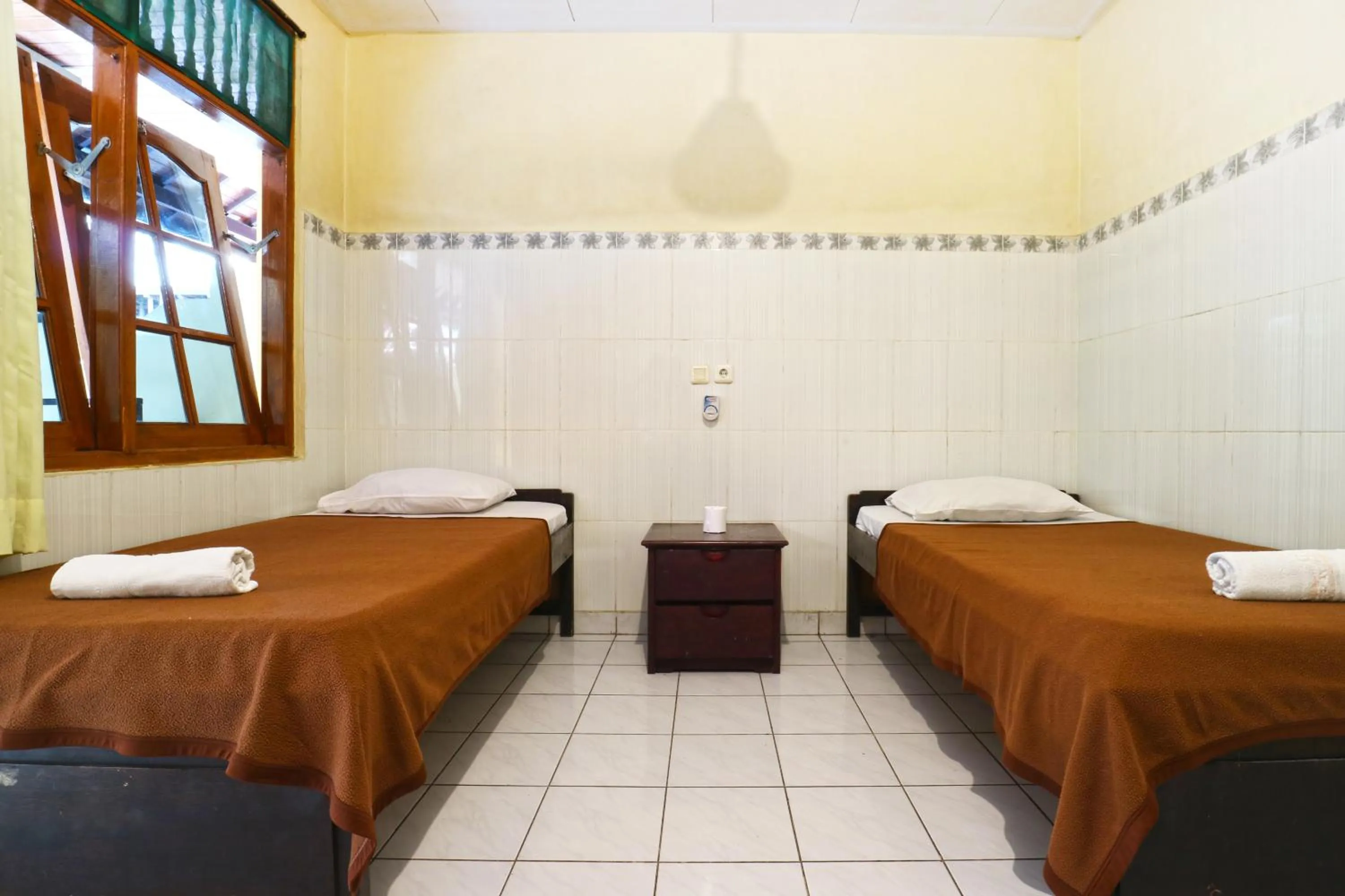 Bedroom, Bed in Gora Beach Inn