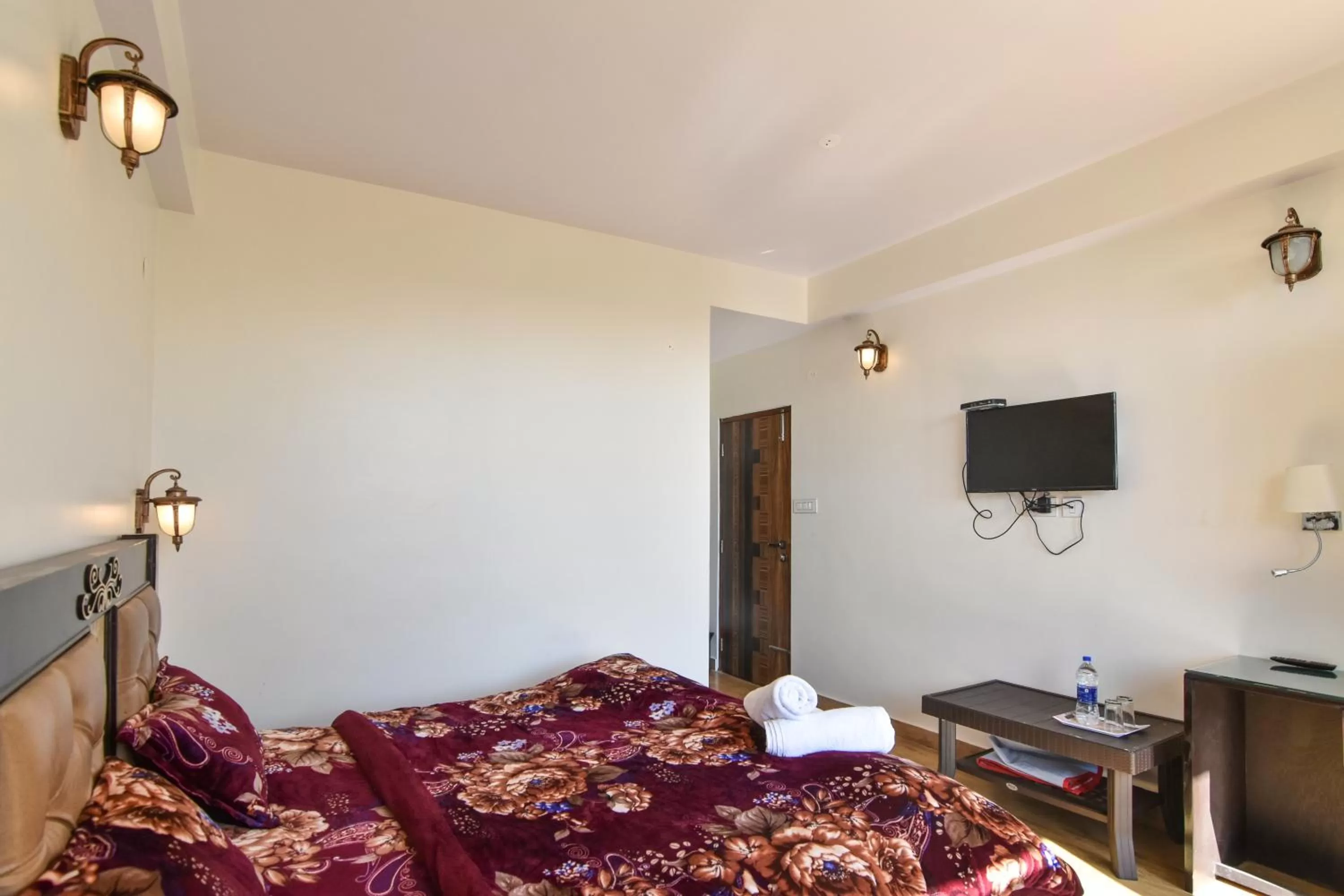 Bedroom, Bed in Dhanlaxmi Apartments