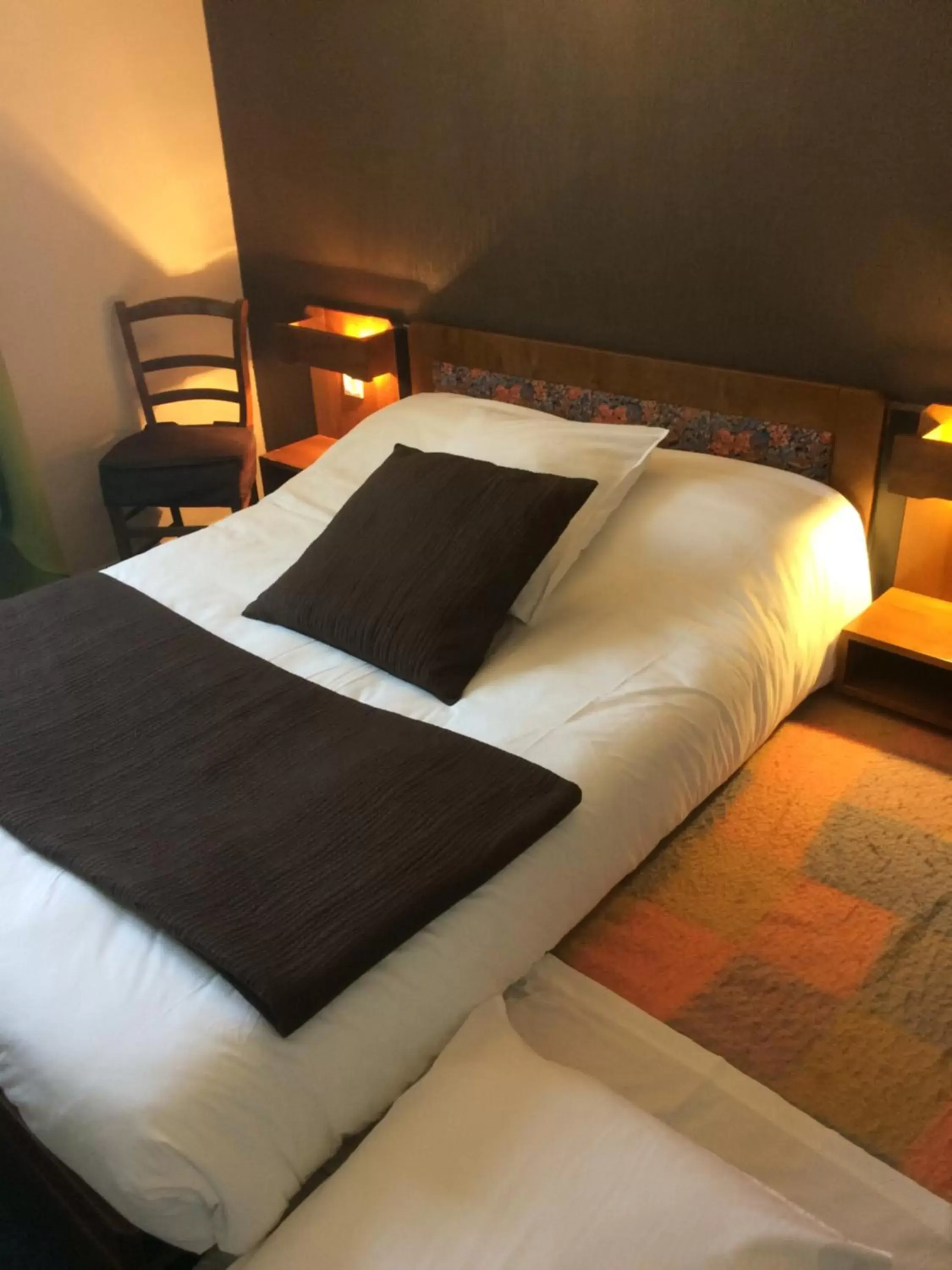 Bed in Hôtel Le Dahu