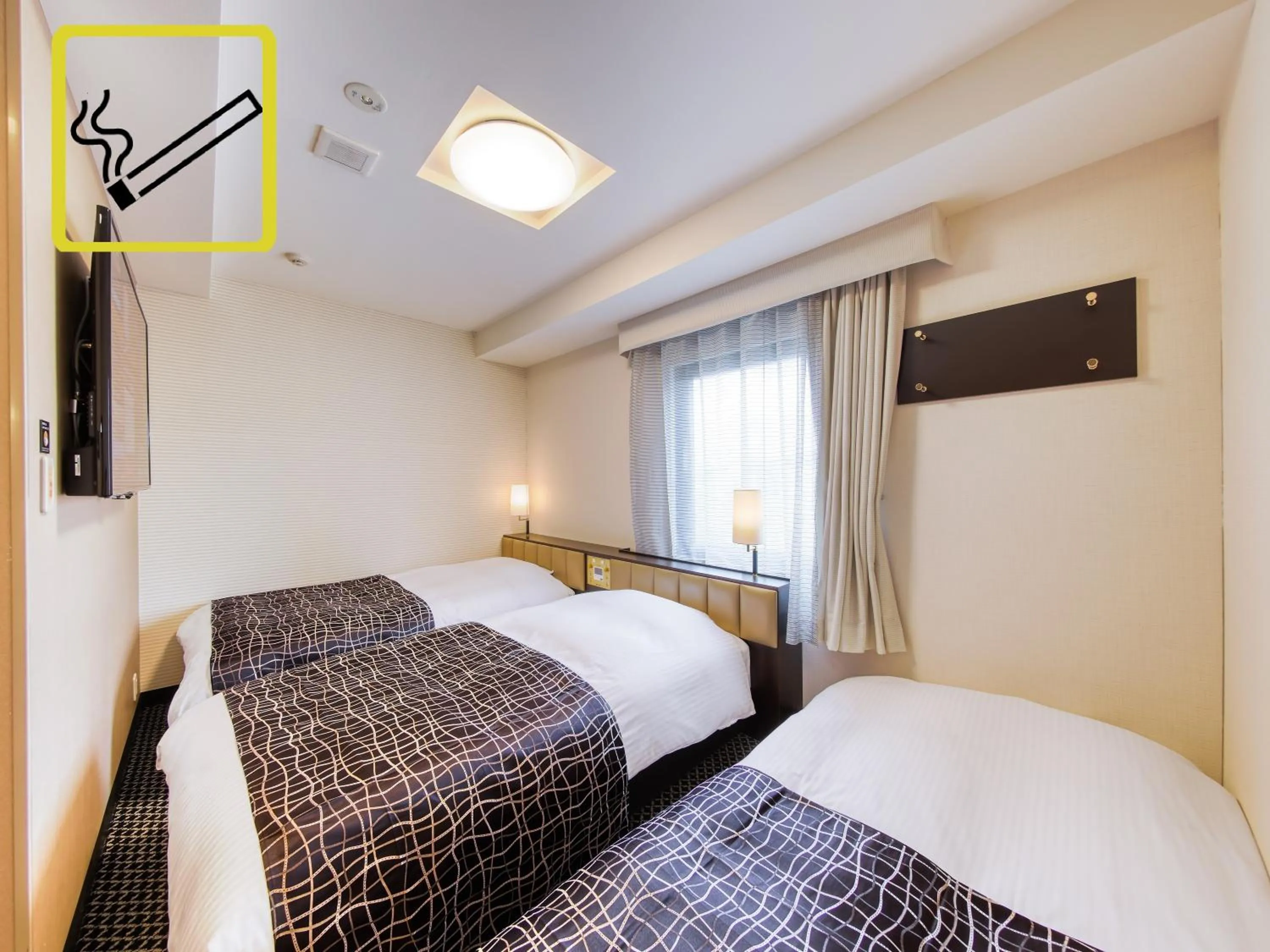 Photo of the whole room, Bed in APA Hotel Hiroshima Ekimae Ohashi