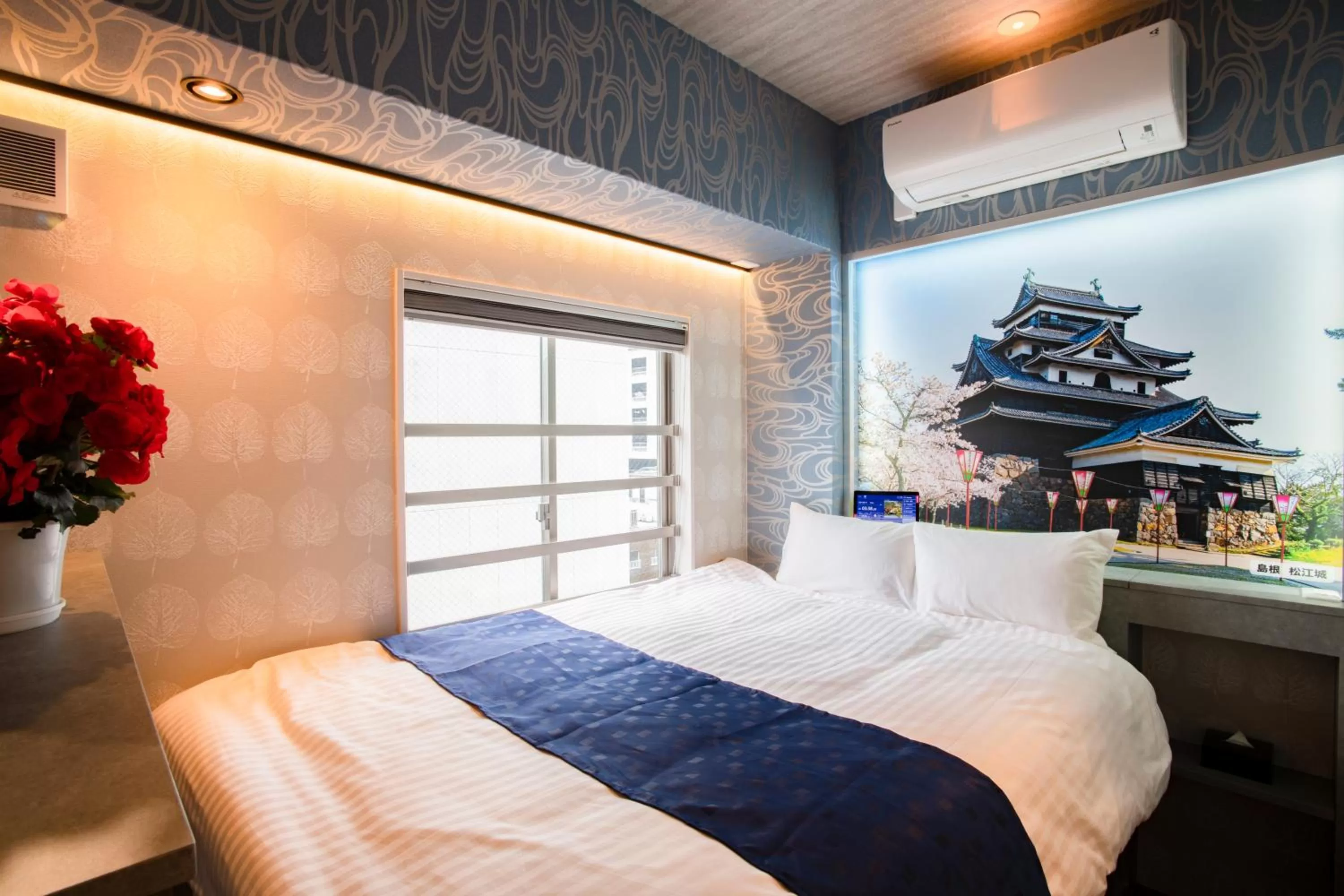 Bed in Hotel Xcell Hiroshima Nagarekawa