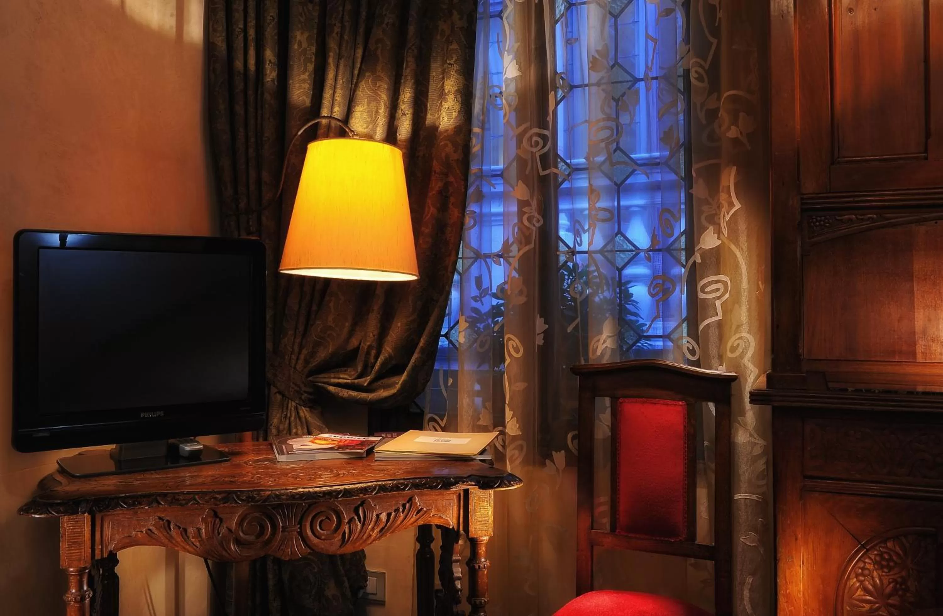 TV and multimedia in Novecento Boutique Hotel