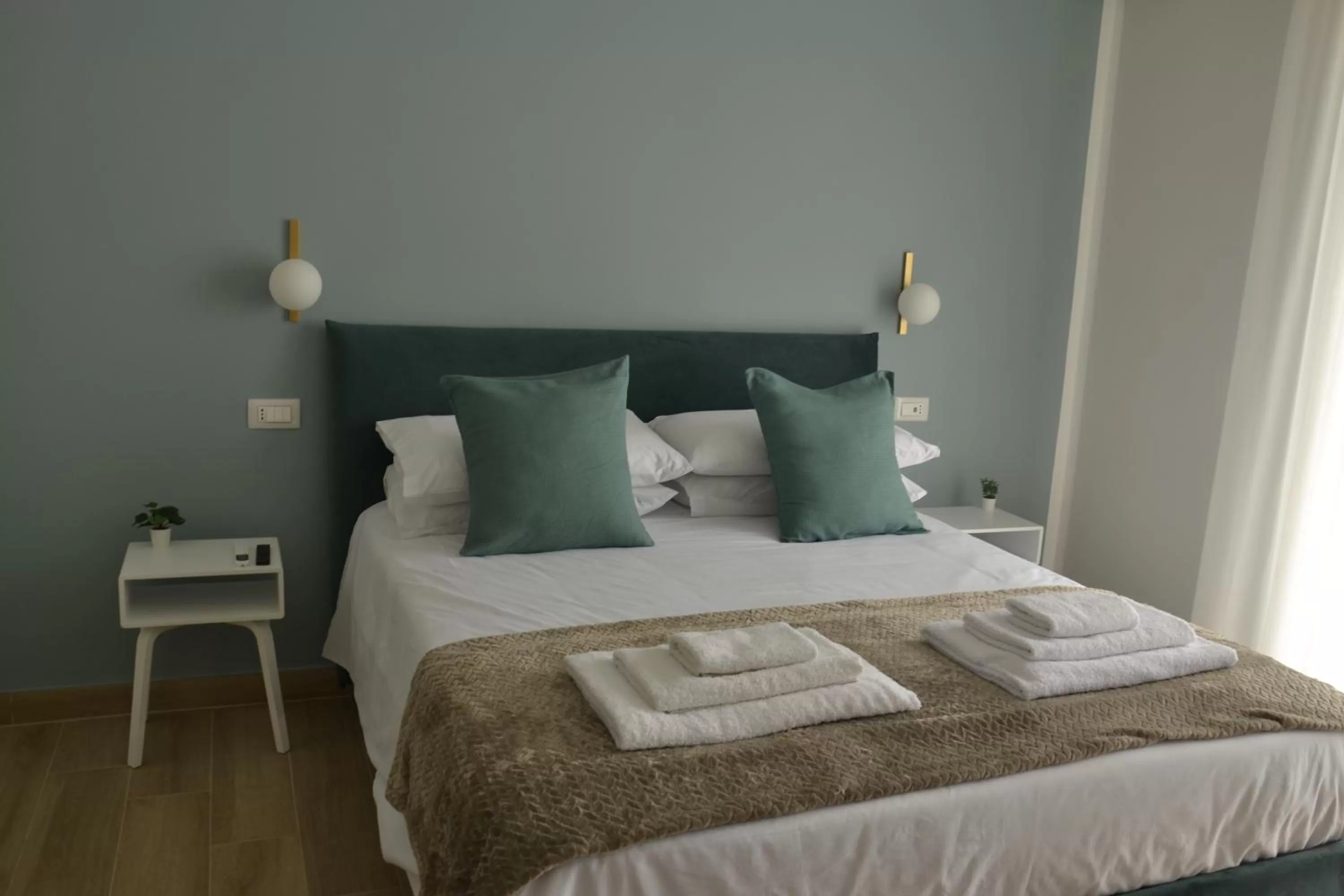 Bed in Luna Nuova Suites