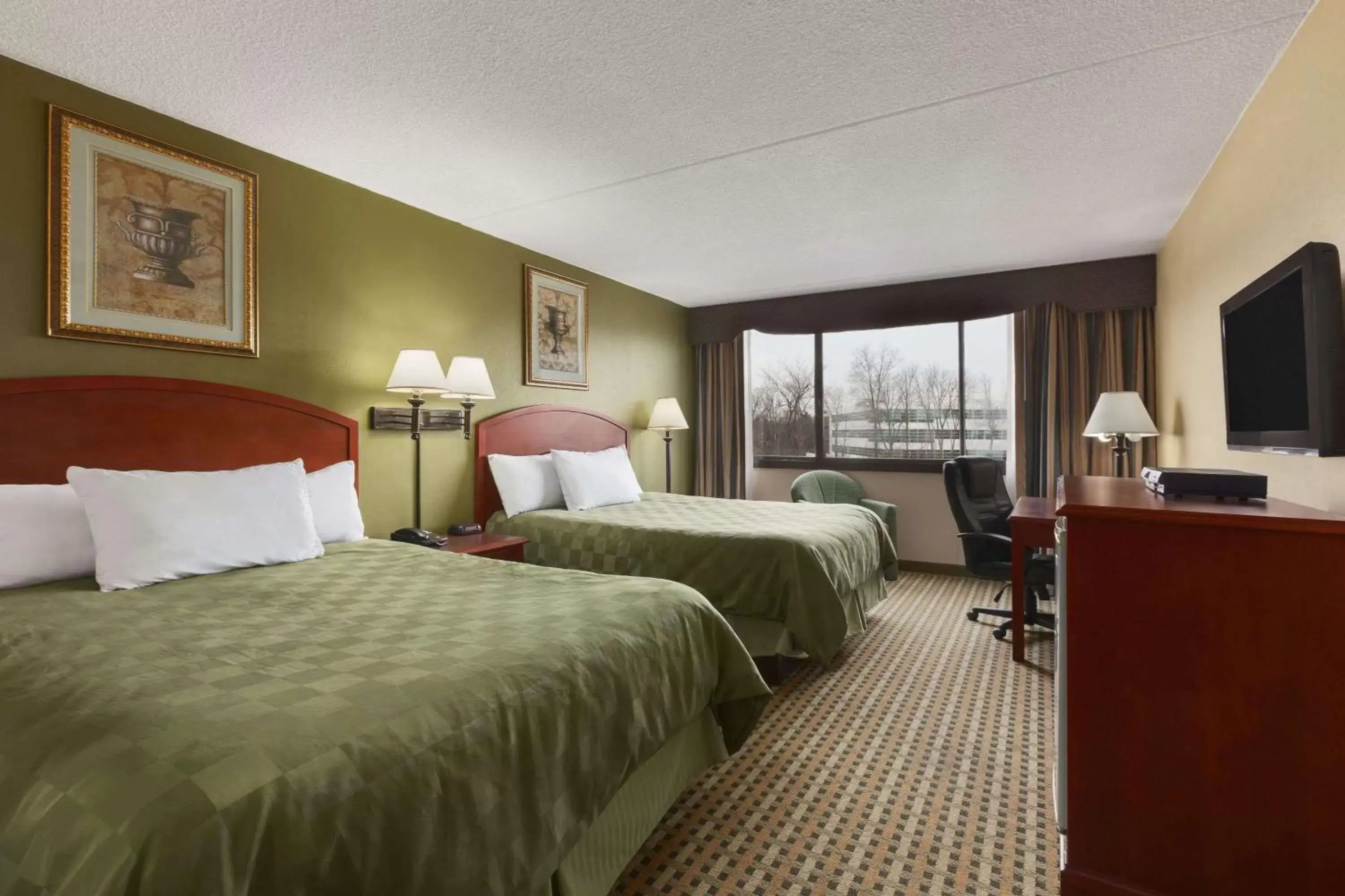 Photo of the whole room, Bed in Ramada by Wyndham Rochelle Park Near Paramus