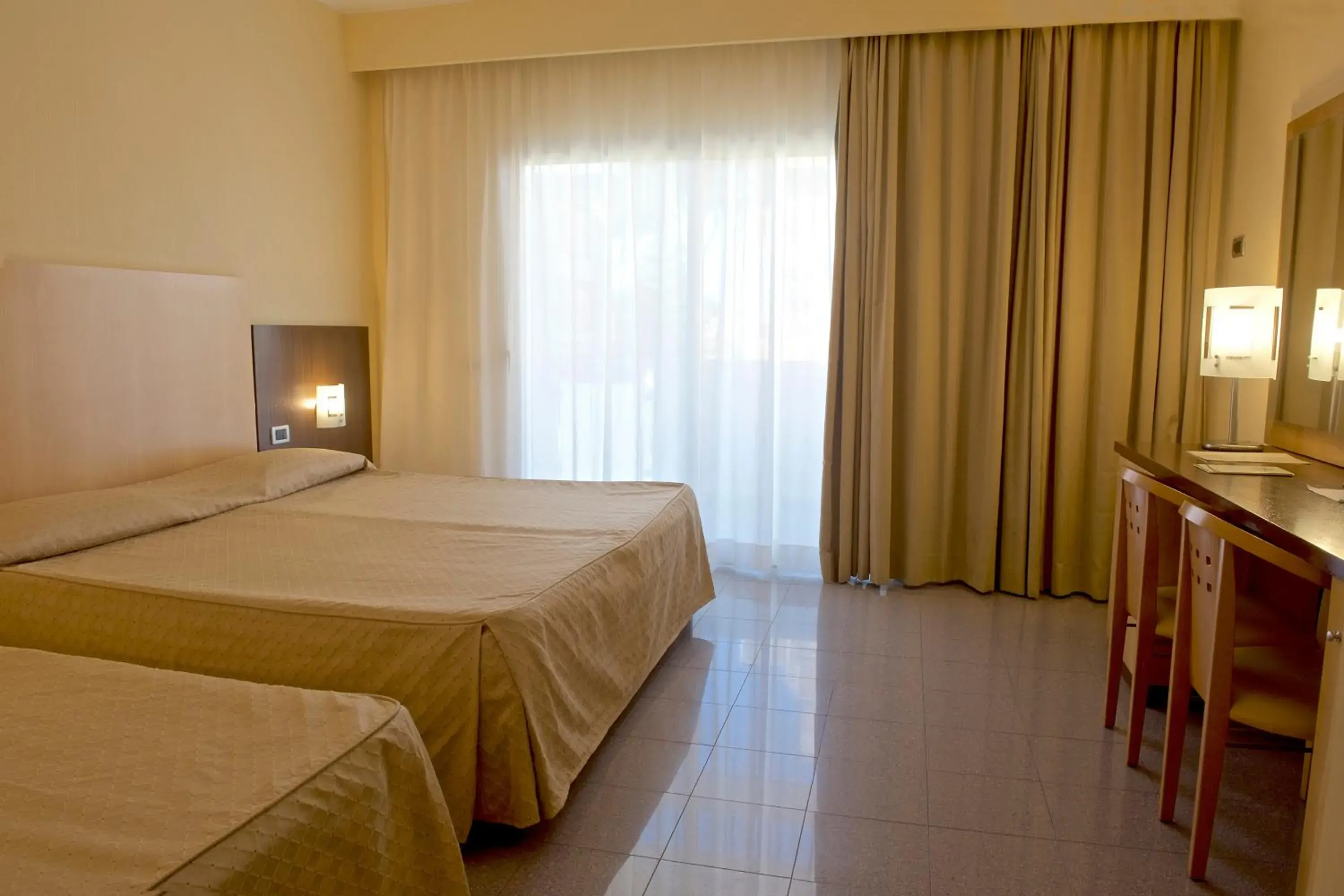 Bed in Albergo Mediterraneo