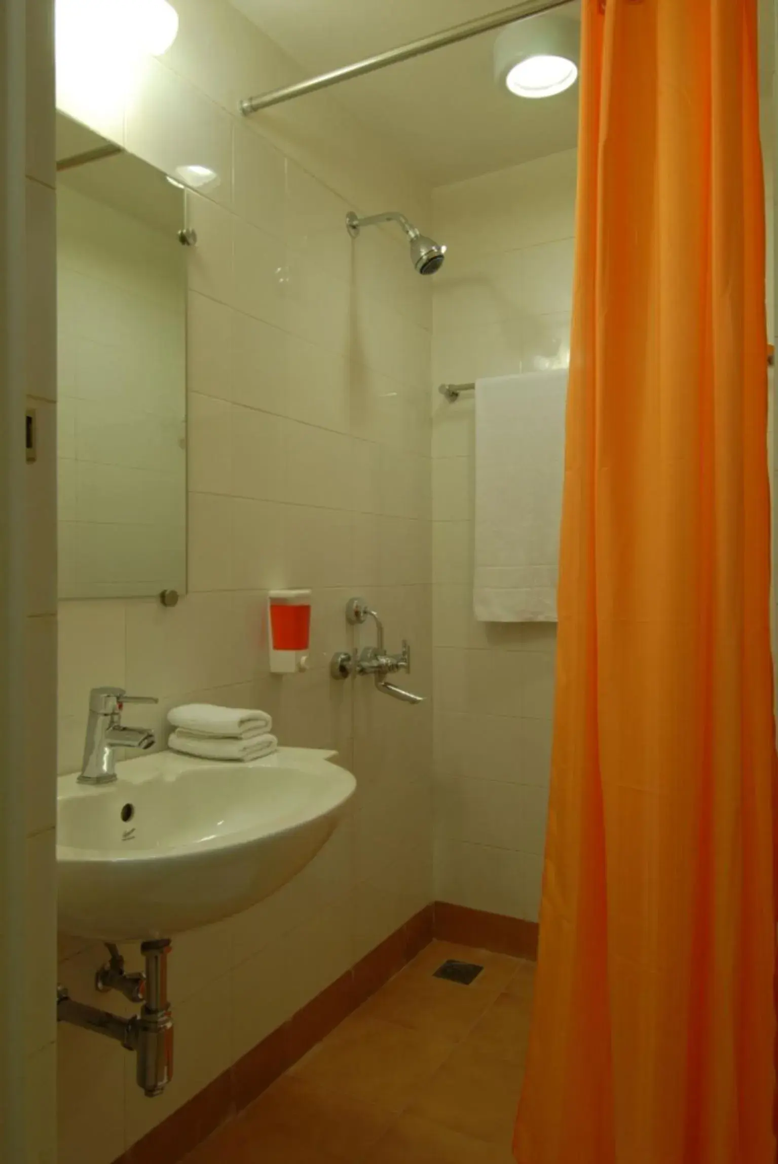 Bathroom in Ginger Hotel Nashik