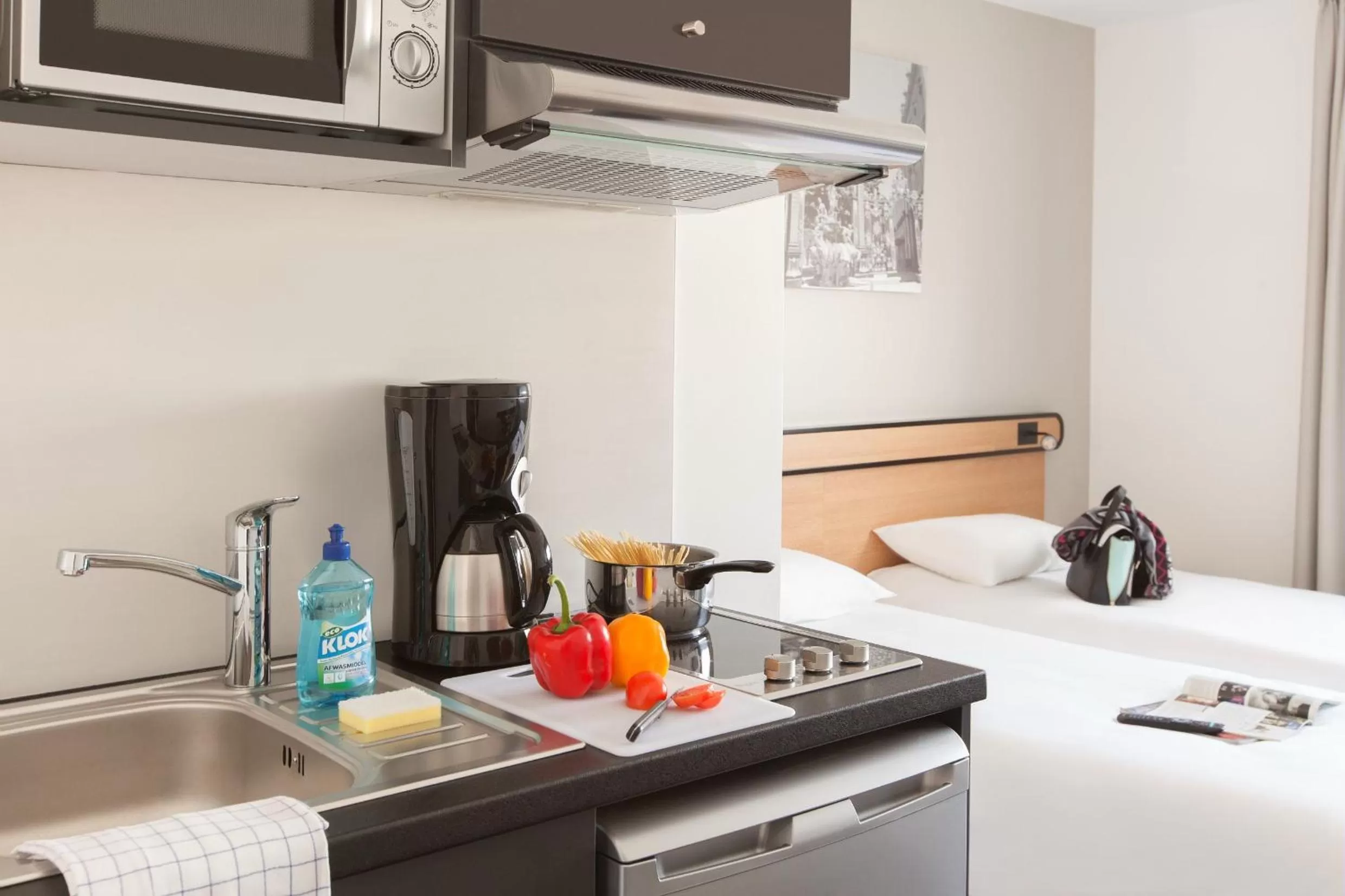 Kitchen or kitchenette in Aparthotel Adagio Access Nancy Centre