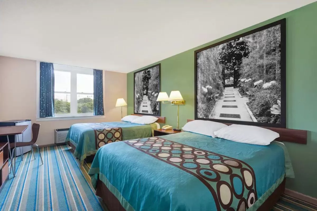 Bed in Super 8 by Wyndham Harrisburg Hershey West