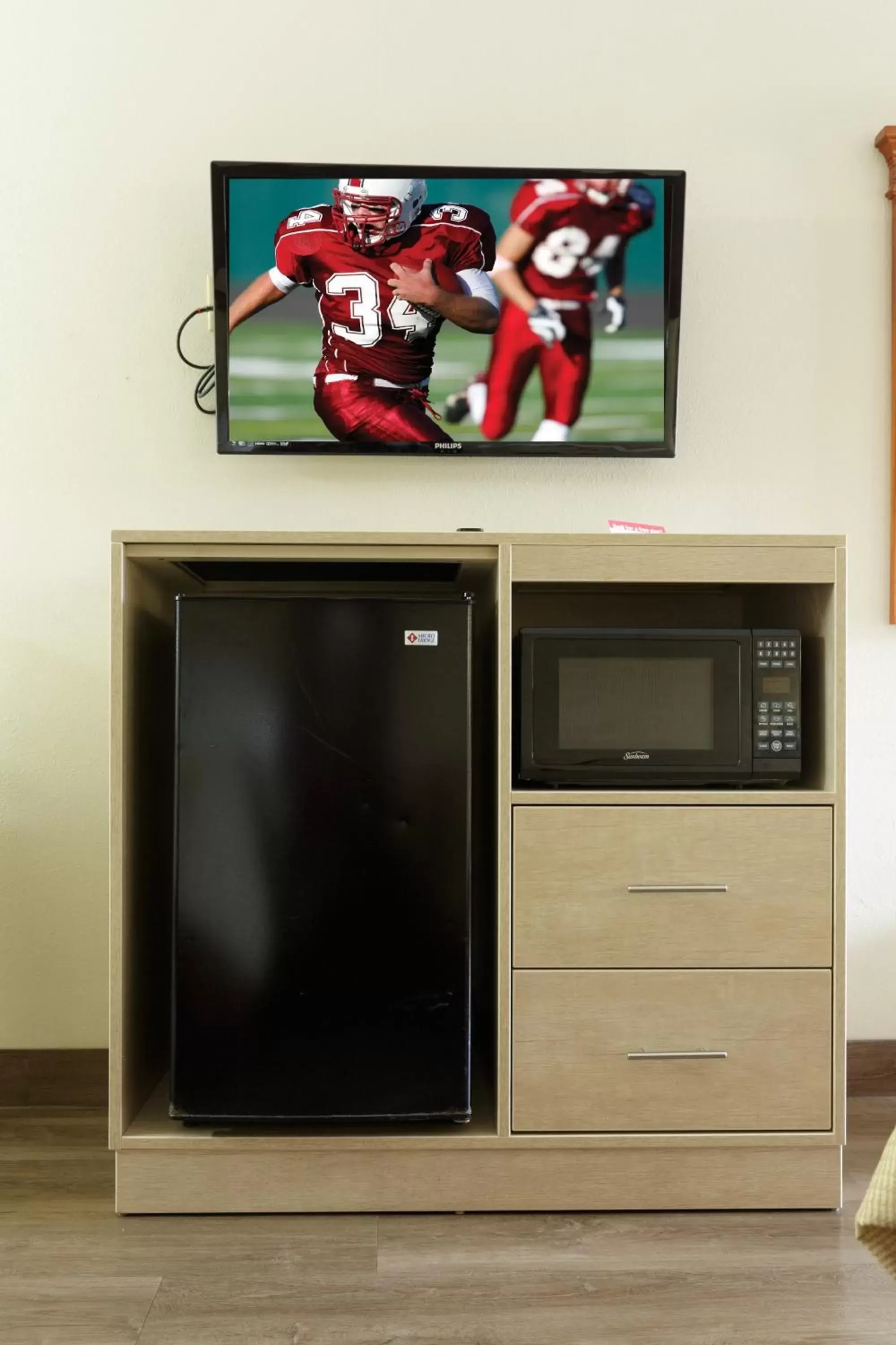 Photo of the whole room, TV/Entertainment Center in Red Roof Inn & Suites Pigeon Forge Parkway