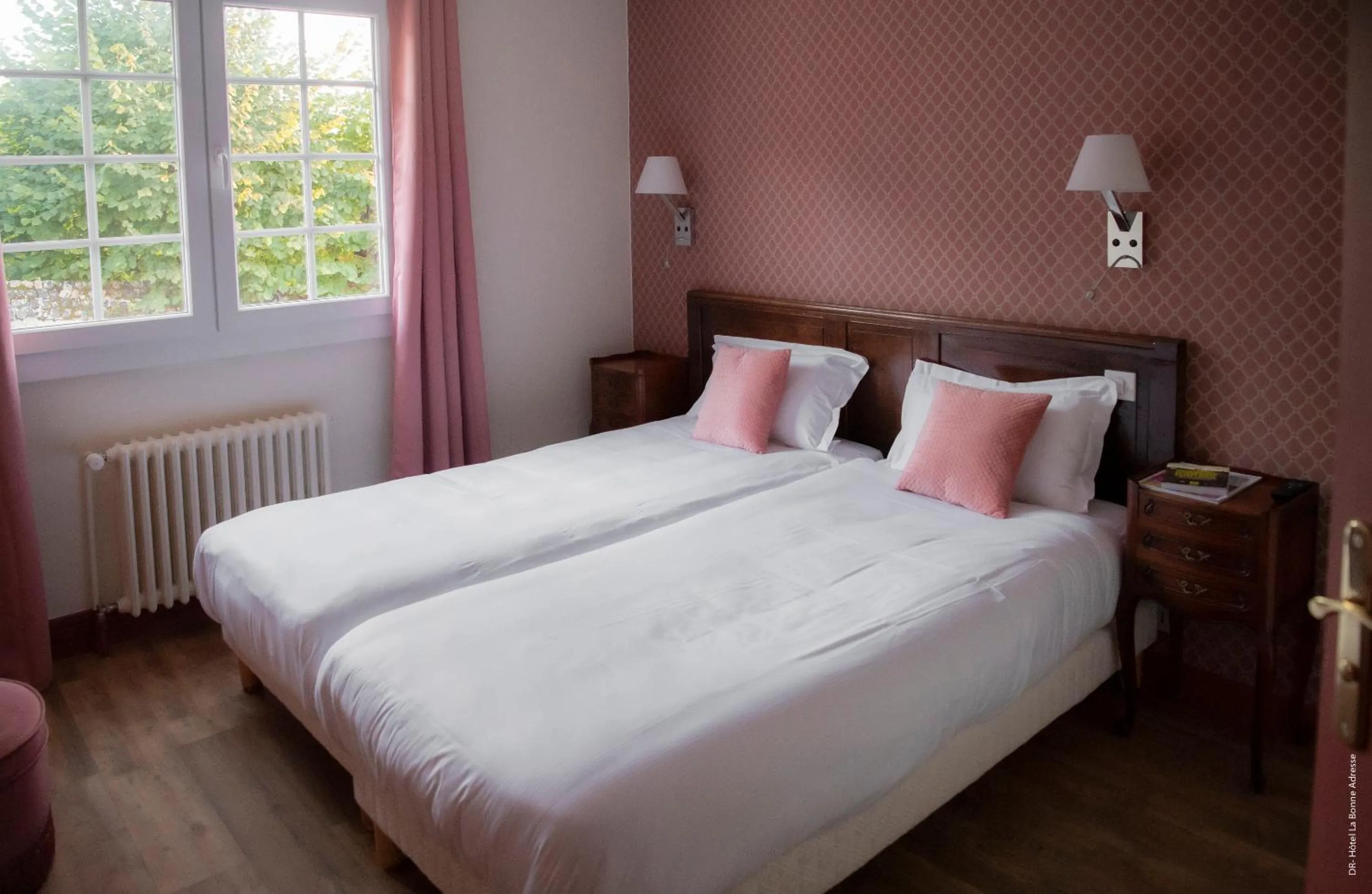 Bed in Hotel de Charme La Bonne Adresse - Logis hotels