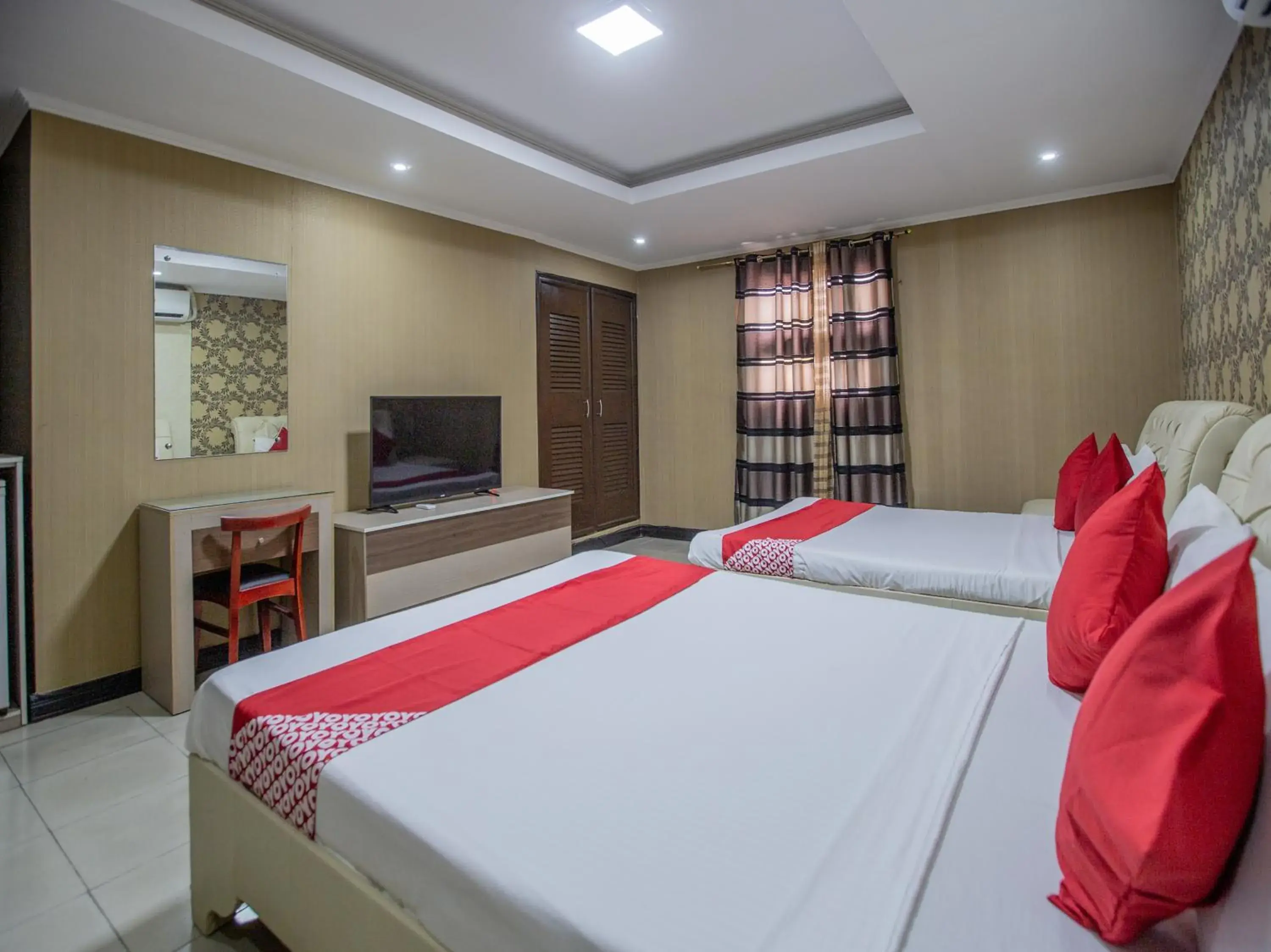 Bedroom in OYO 700 Pj Inn Hotel