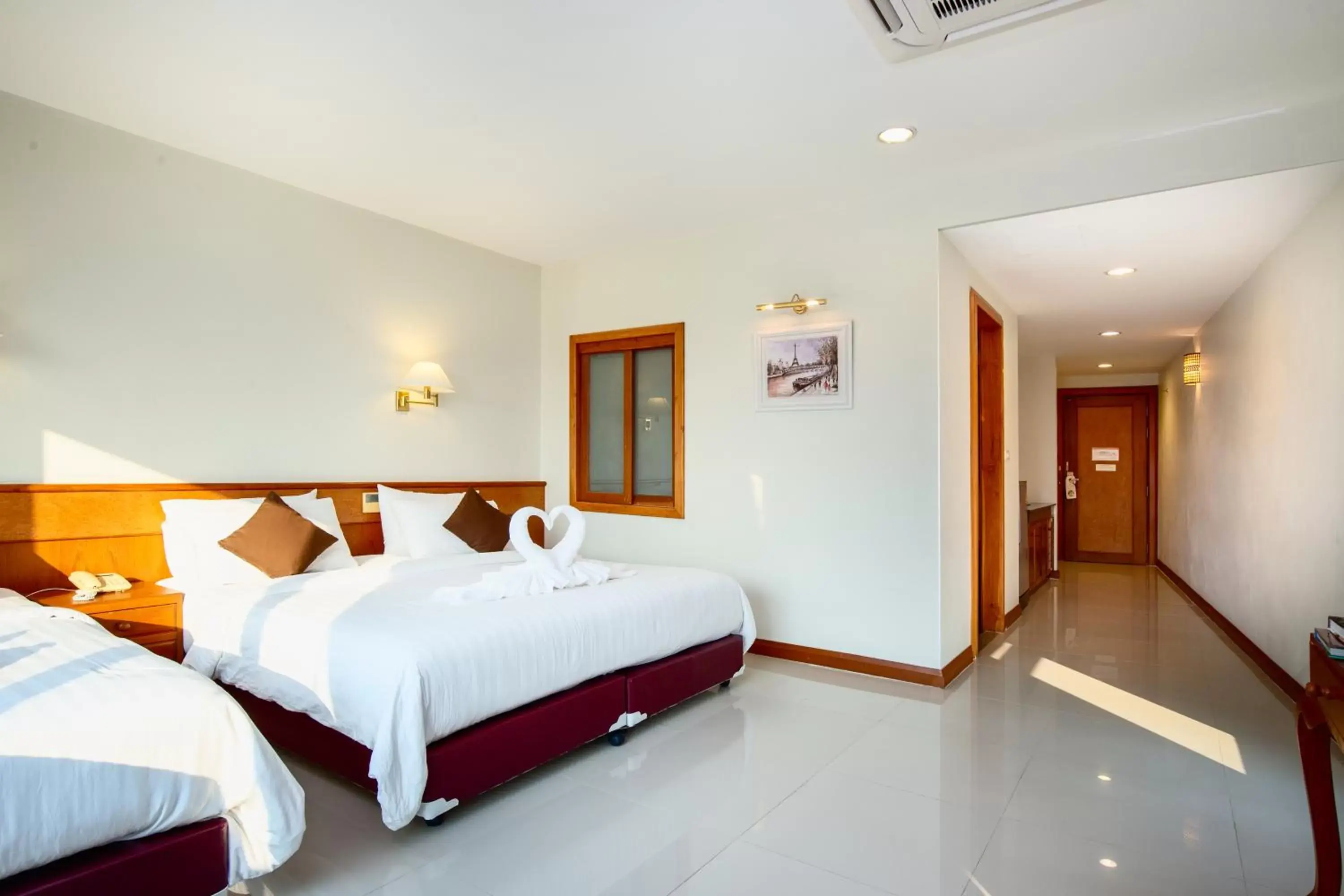 Bed in Kanchanaburi City Hotel - SHA Extra Plus