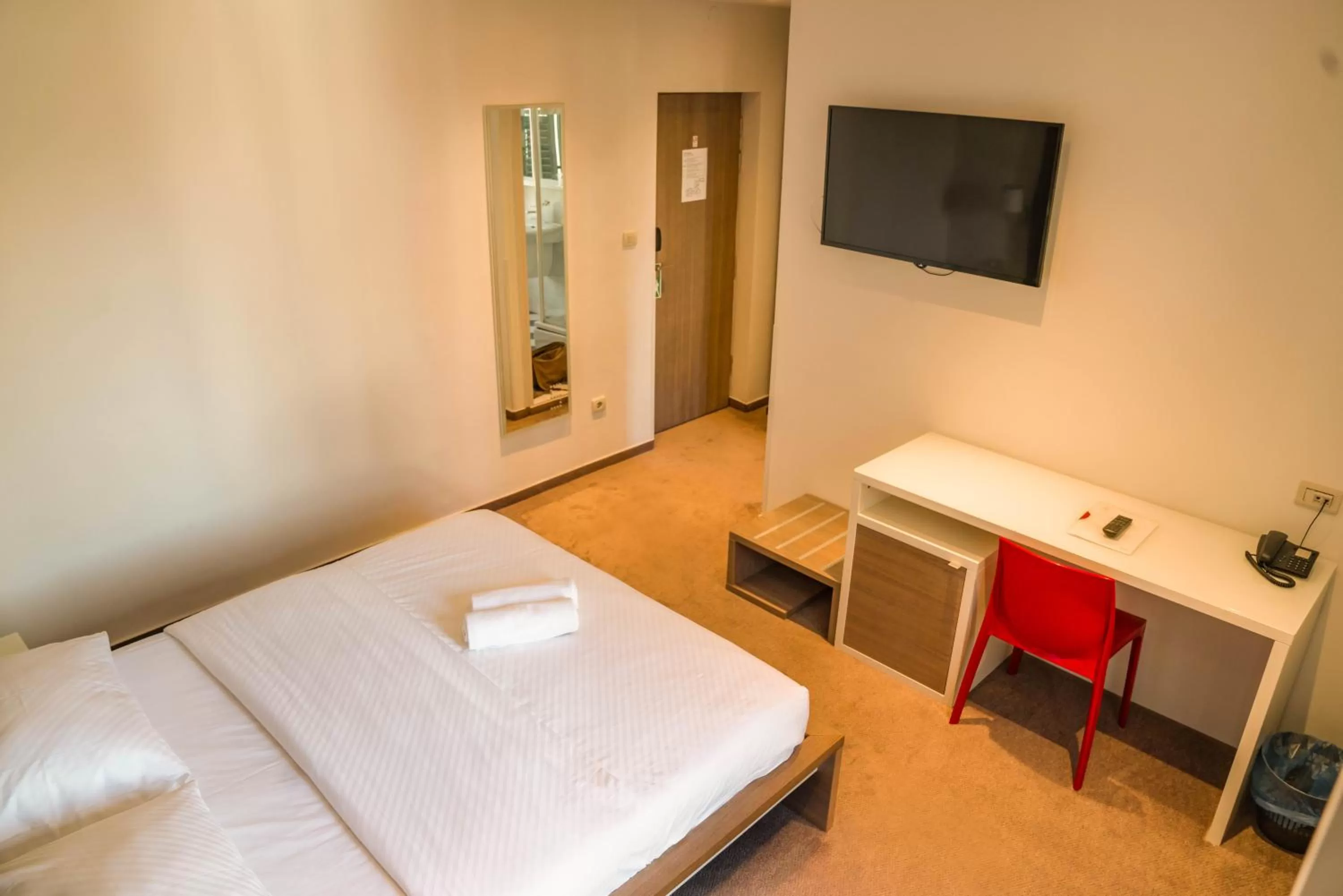 Bed in Slavija Culture Heritage Hotel