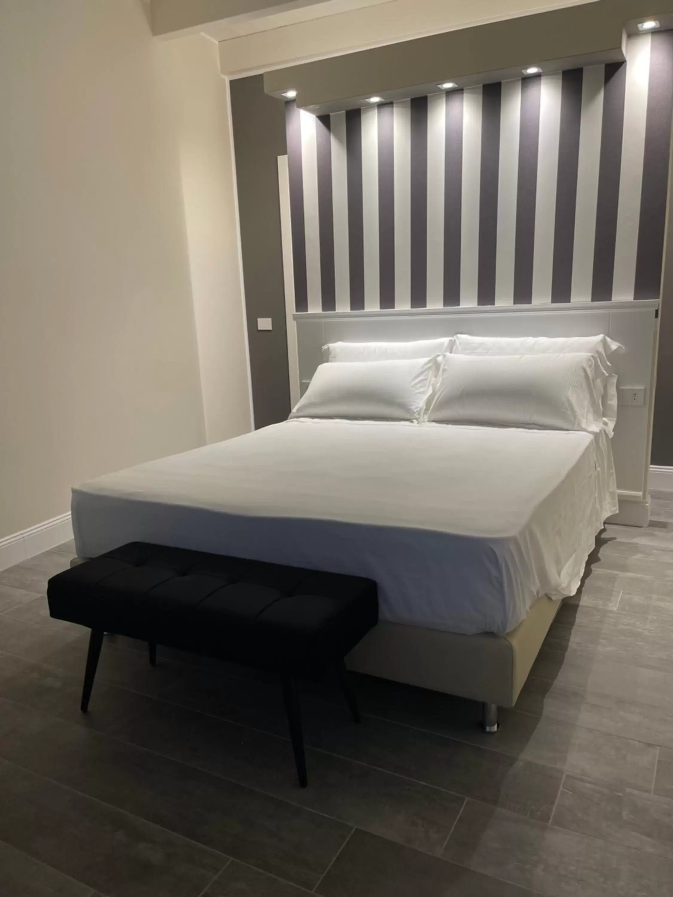 Bed in 18 Dante Luxury Suites