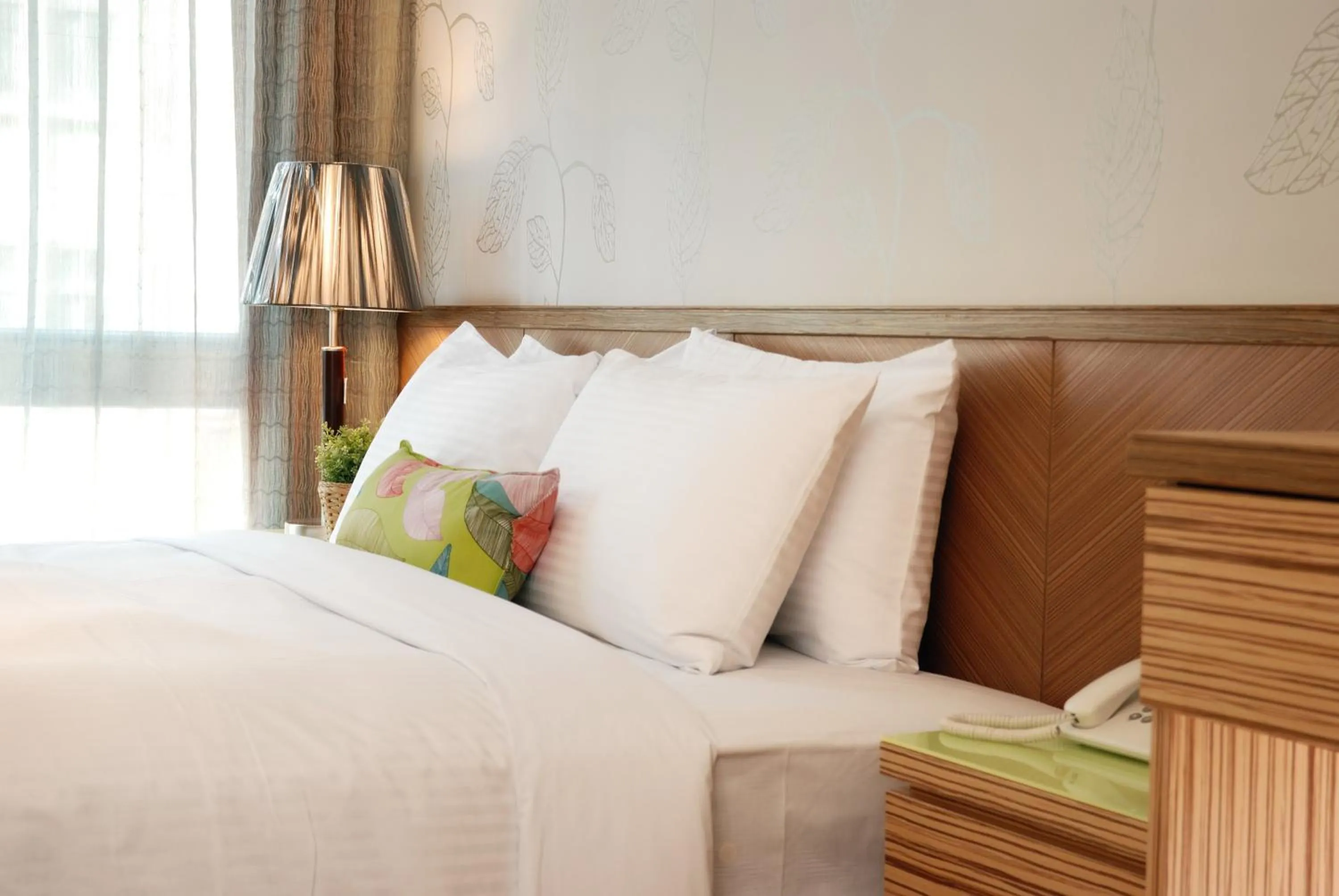 Bed in NAGAHIRO Hotel