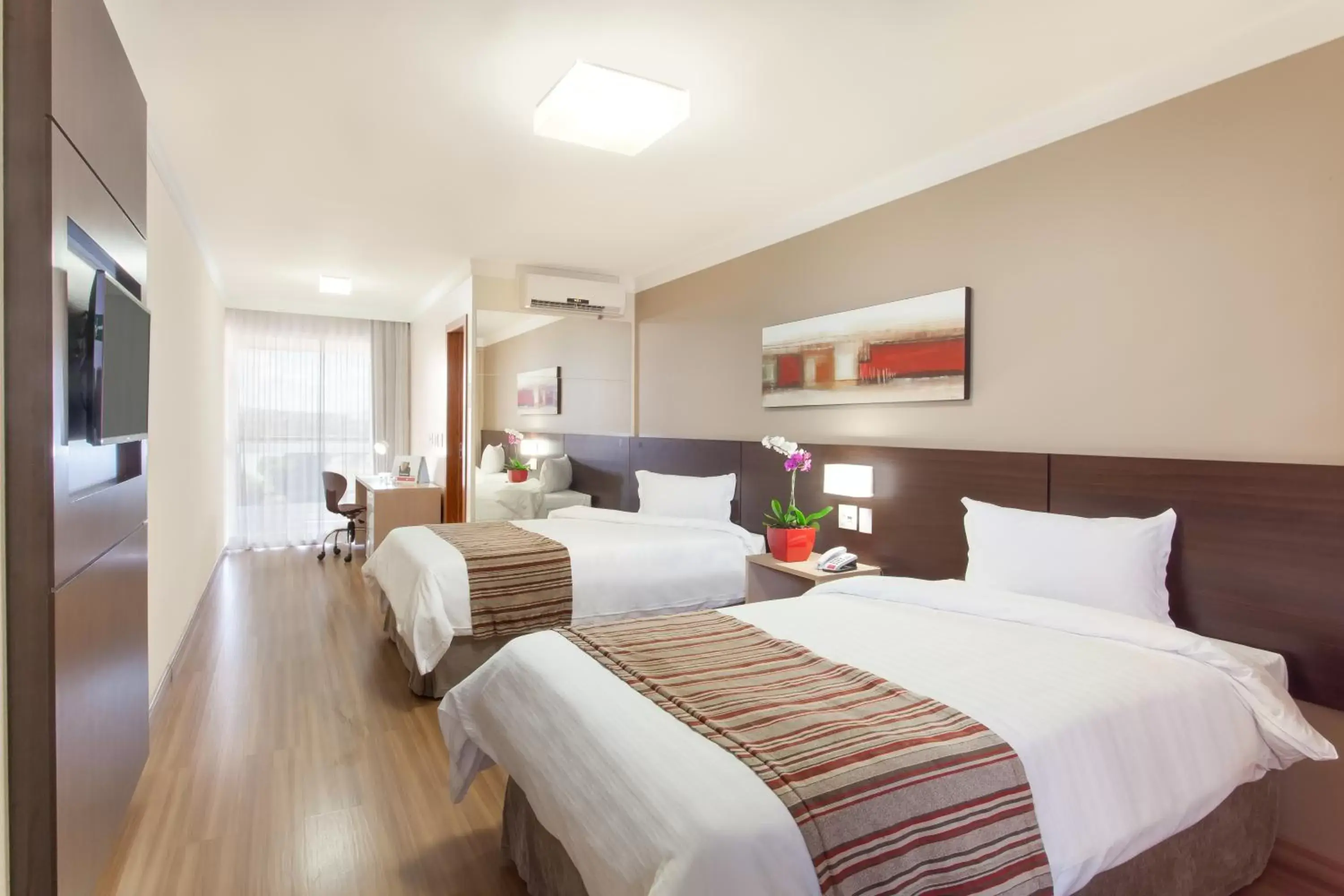 Bedroom, Bed in Ramada Hotel & Suites Lagoa Santa By Wyndham