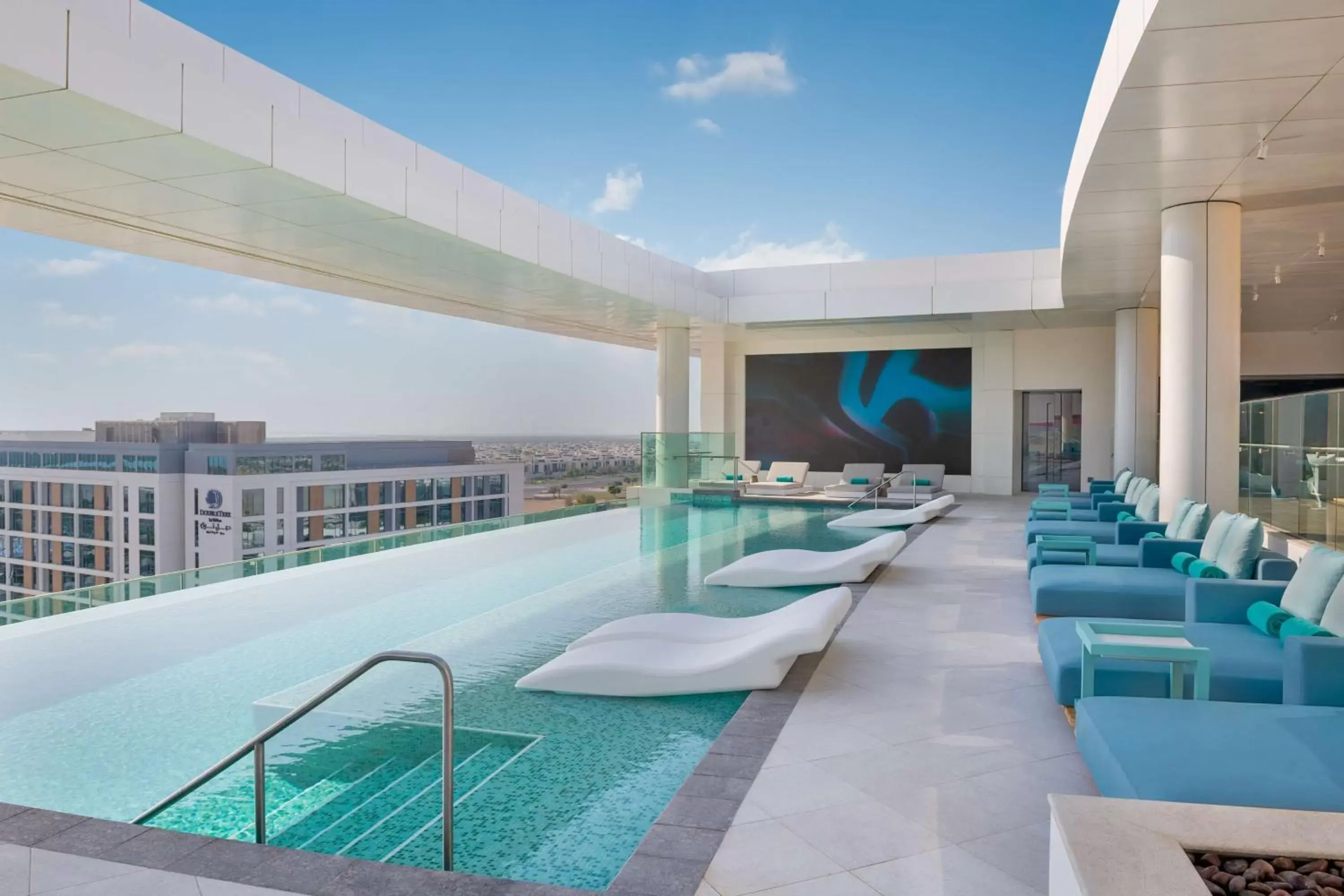 Pool view, Swimming Pool in The WB Abu Dhabi, Curio Collection By Hilton