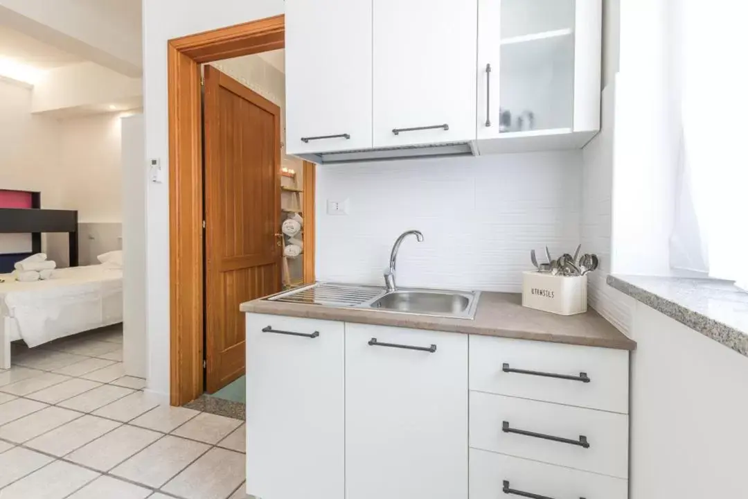 Kitchen/Kitchenette in La Gemma del Salento Rooms&Apartments