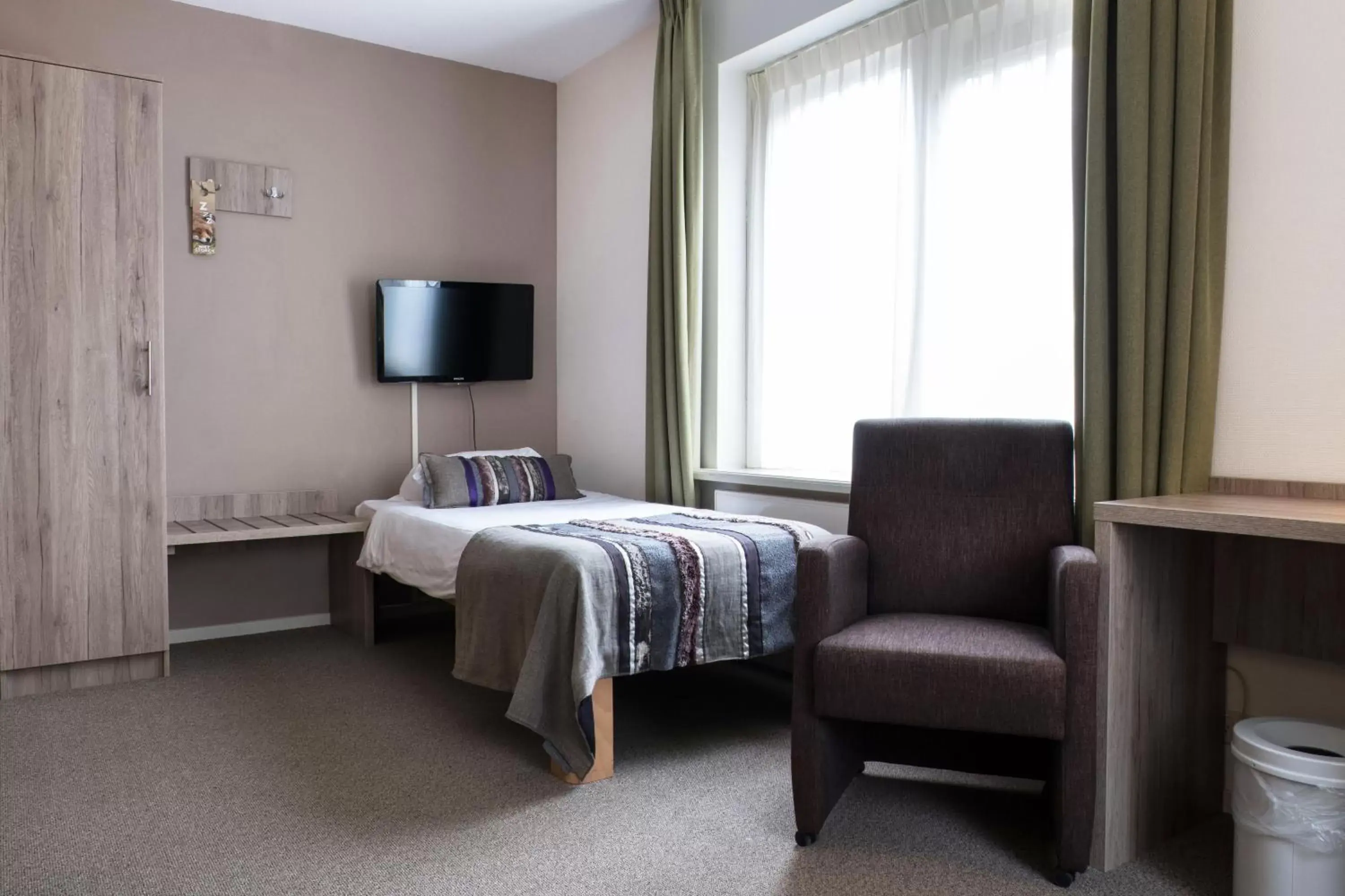 Bedroom, TV/Entertainment Center in Landgoedhotel Woodbrooke Barchem