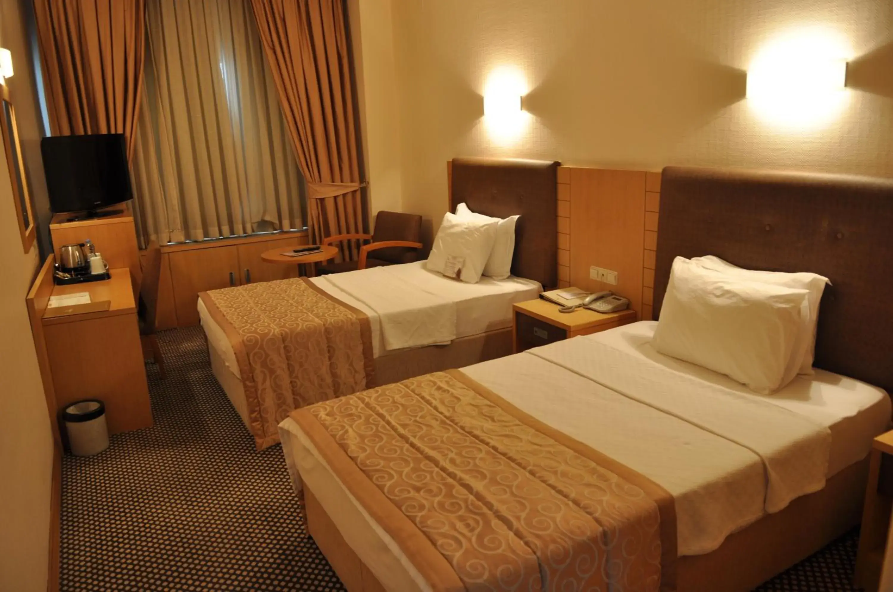 Bed in Surmeli Adana Hotel