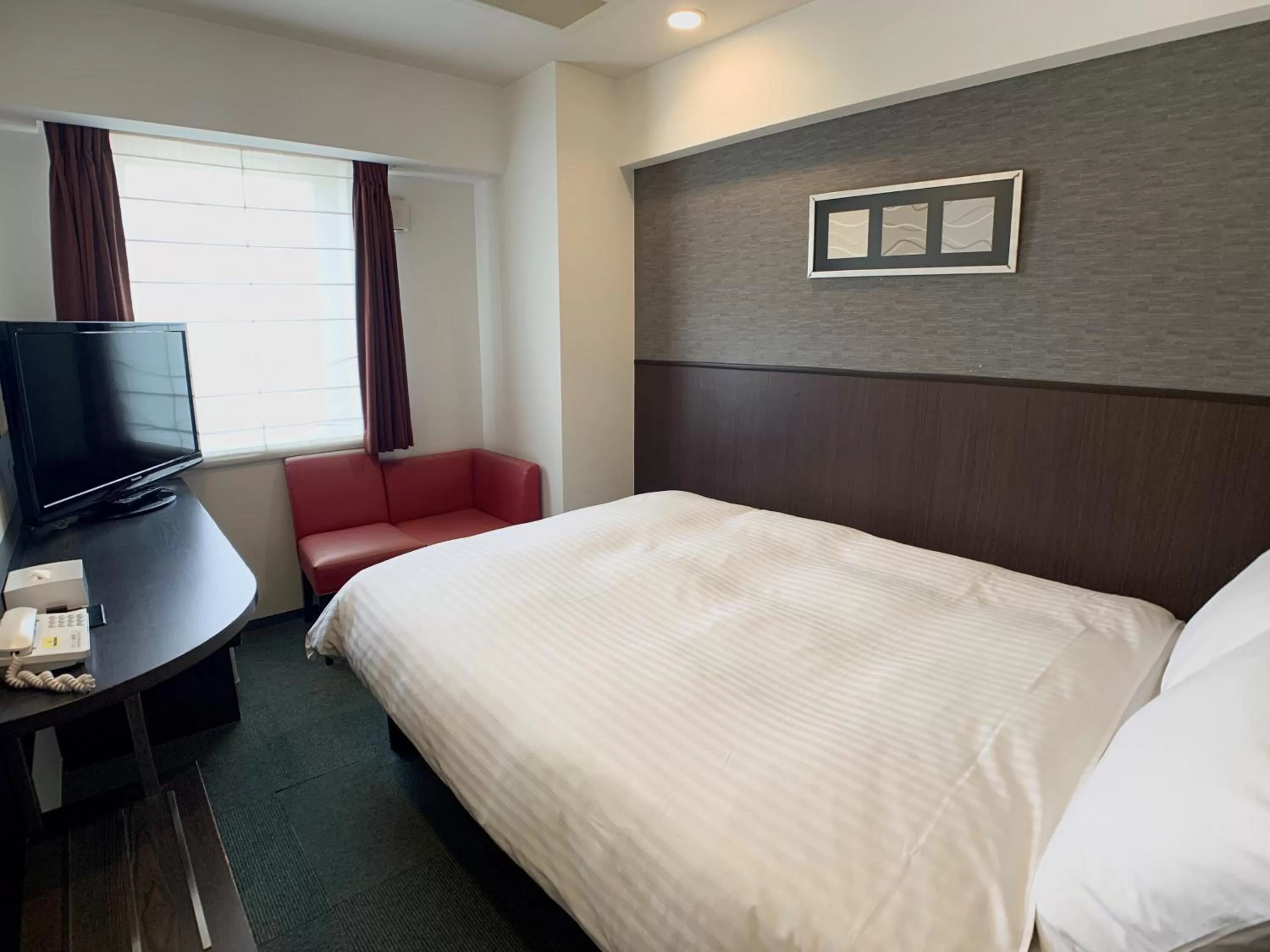 Bed in Smile Hotel Nagoya Sakae