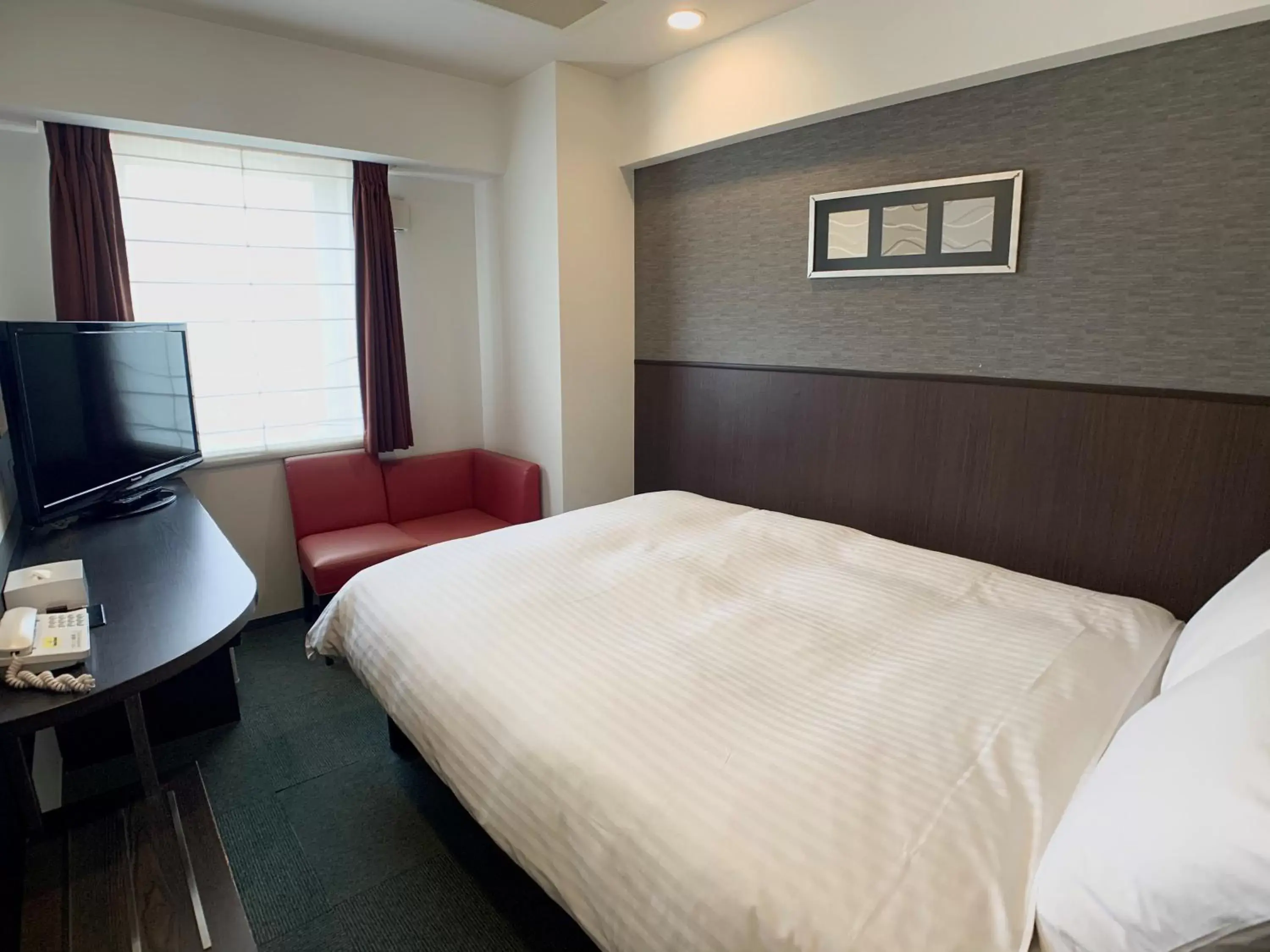 Bed in Smile Hotel Nagoya Sakae