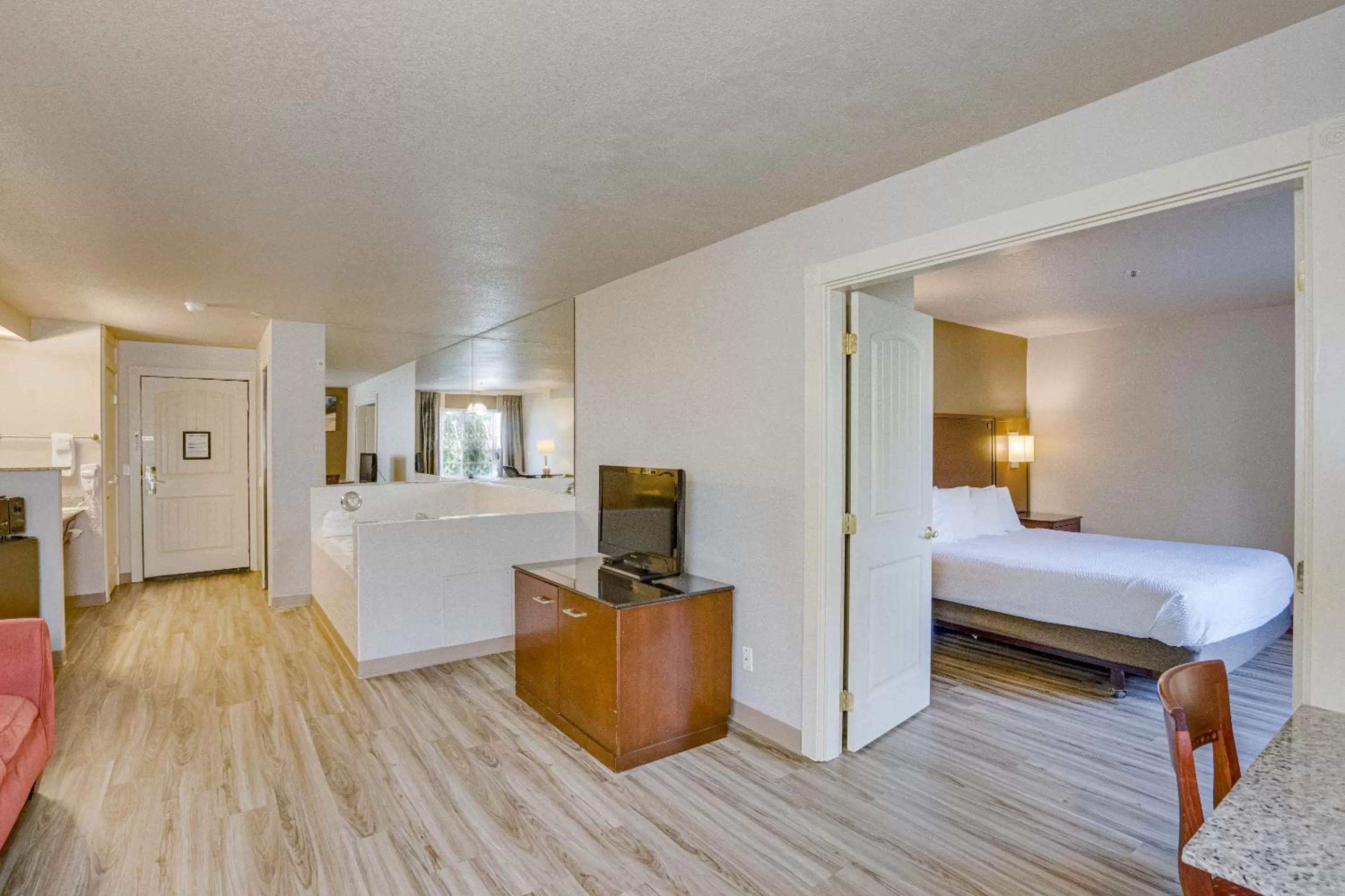 Bed in The Ashley Inn & Suites