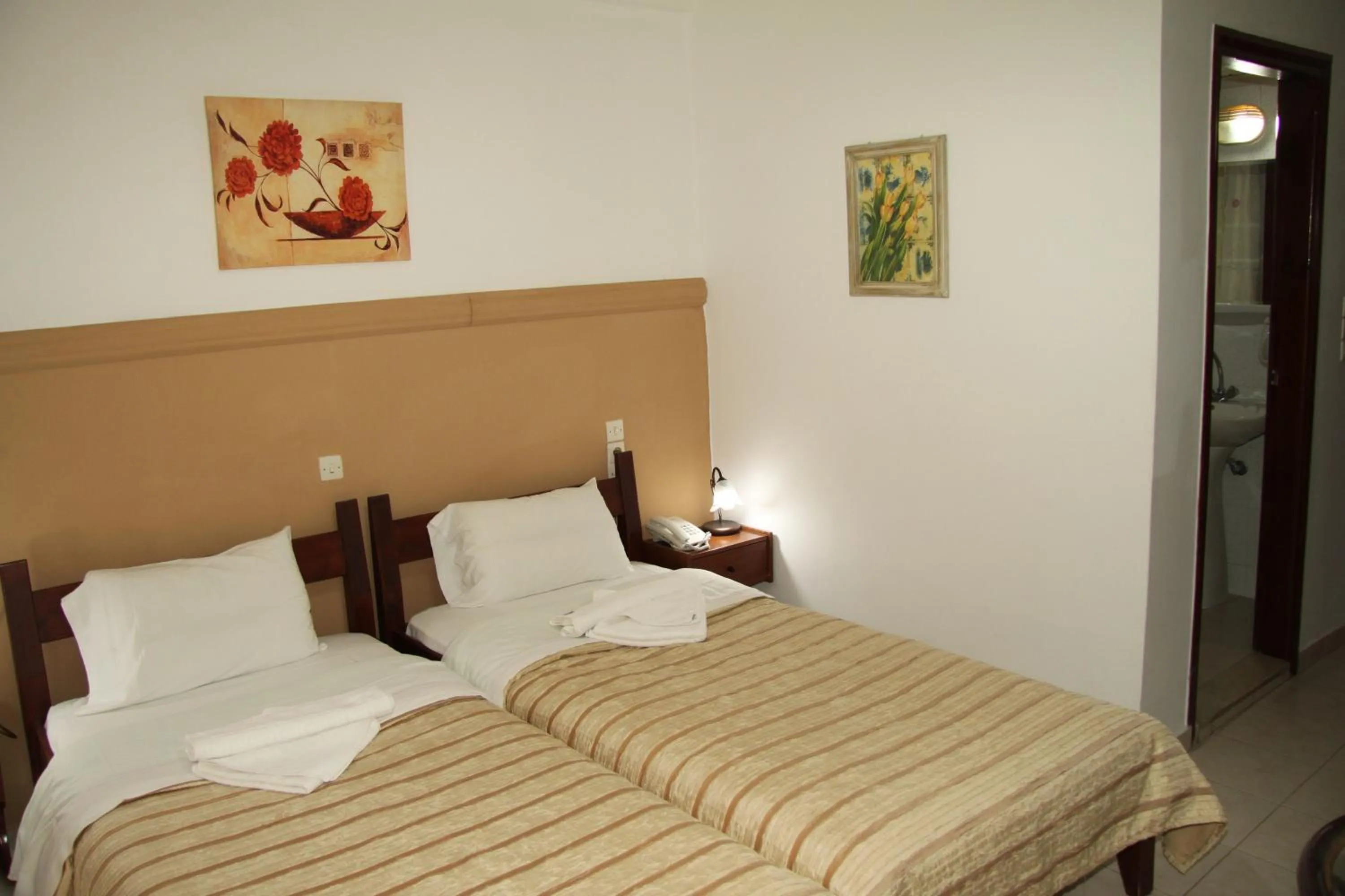 Bedroom, Bed in Danaos Hotel