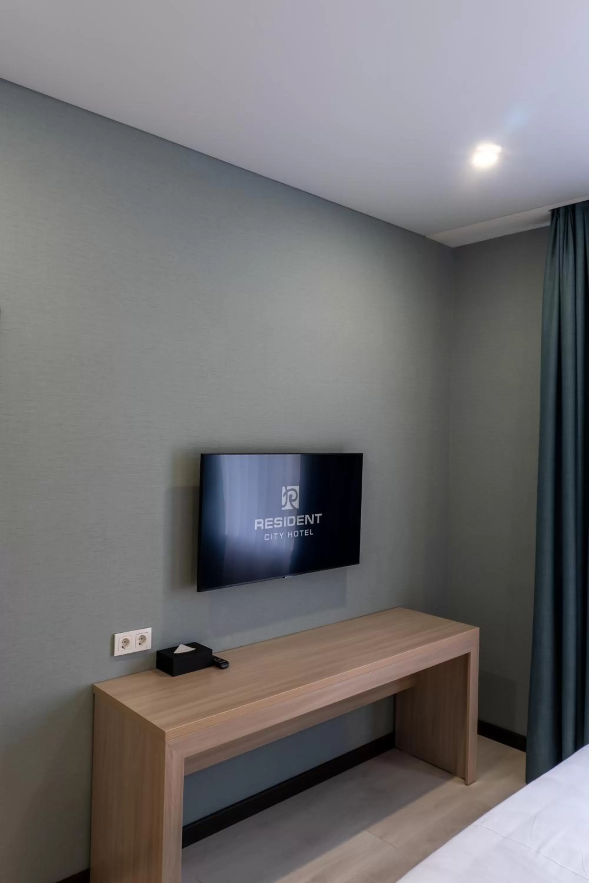 TV and multimedia, TV/Entertainment Center in Resident Hotel Kazybek Bi