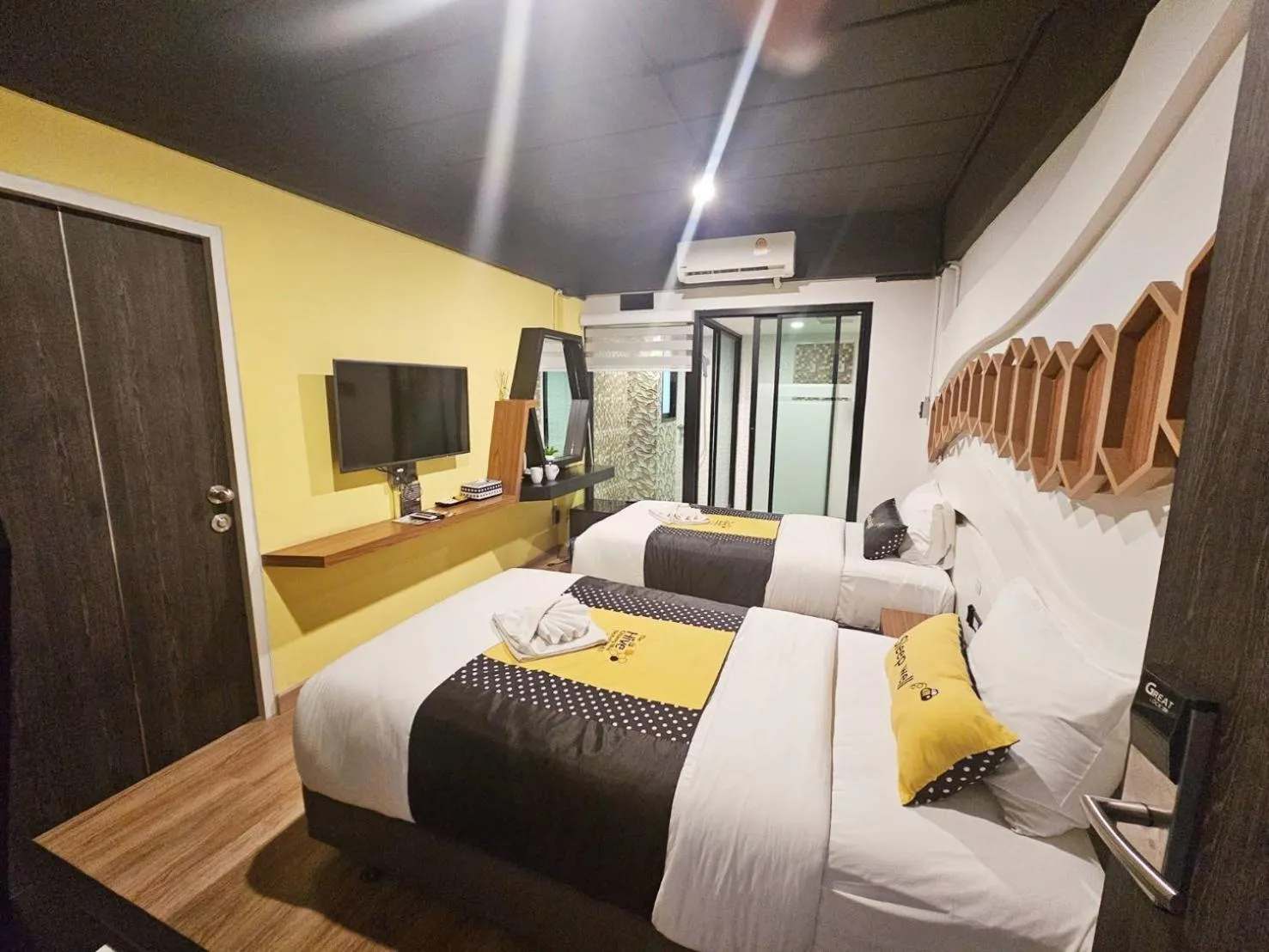 Bed in The Hive Chiang Mai Hotel