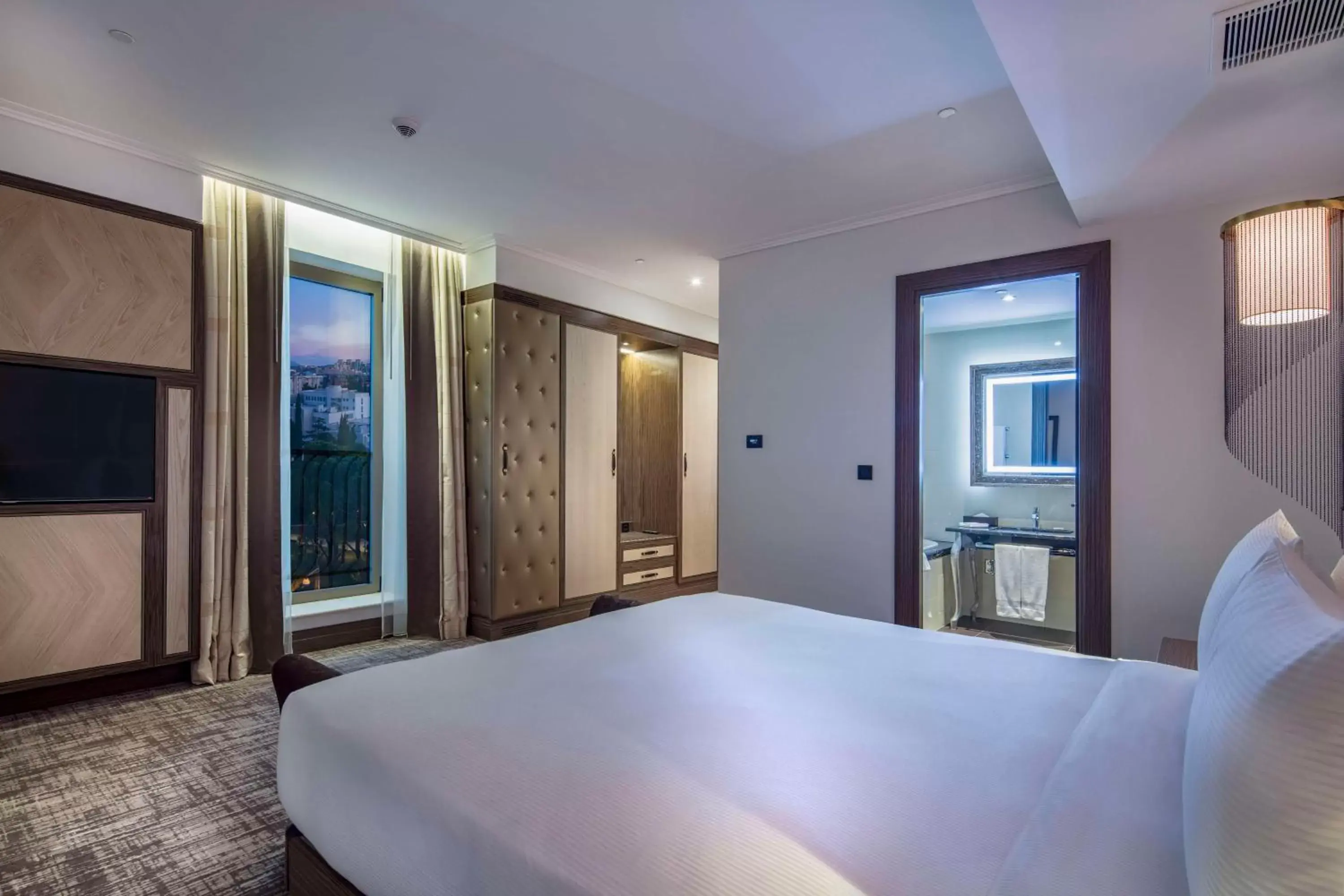 View (from property/room), Bed in Hilton Podgorica Crna Gora View (from property/room), Bed in Hilton Podgorica Crna Gora