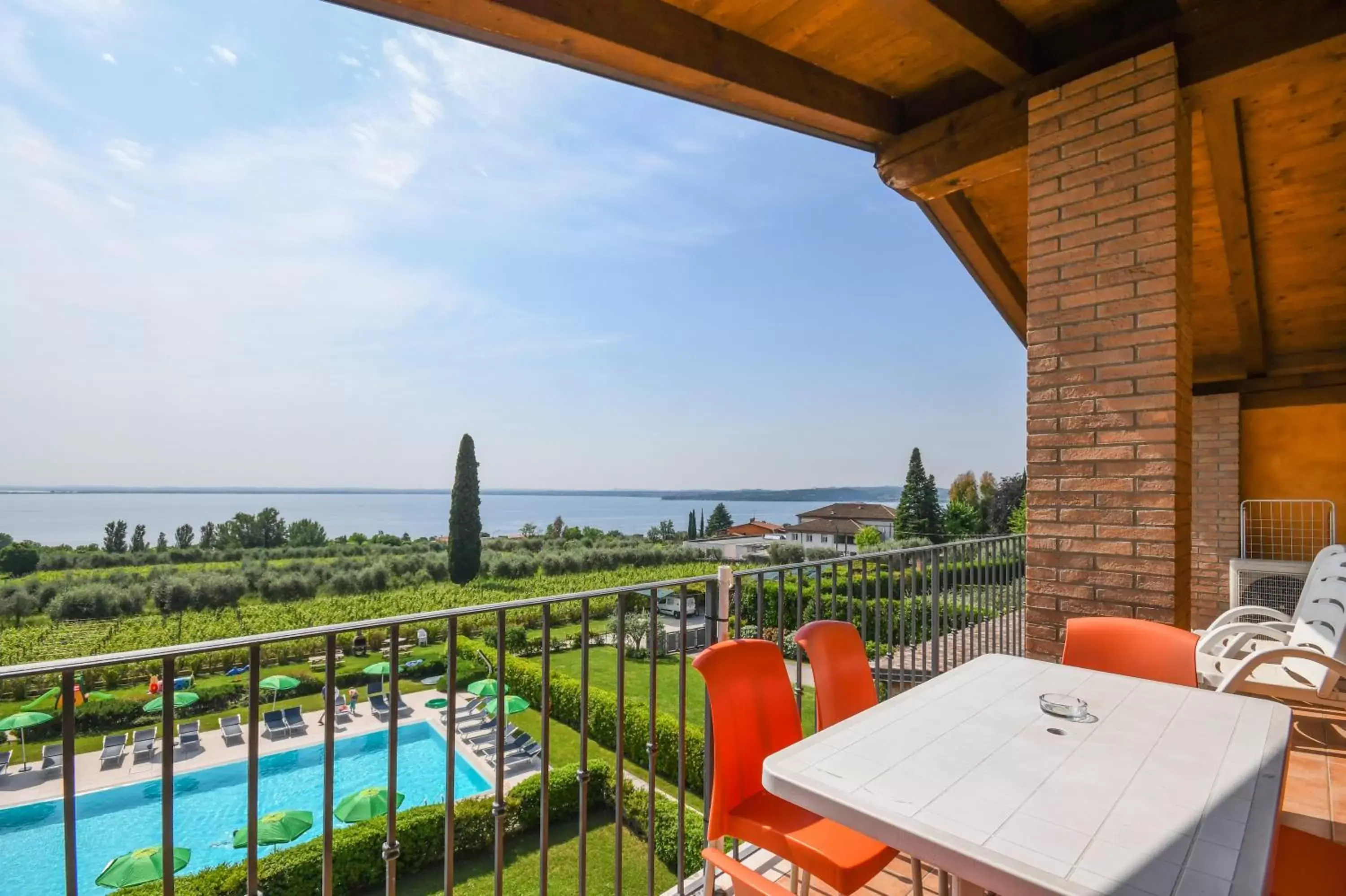 Balcony/Terrace, Pool View in Residence Corte Ferrari -Ciao Vacanze-