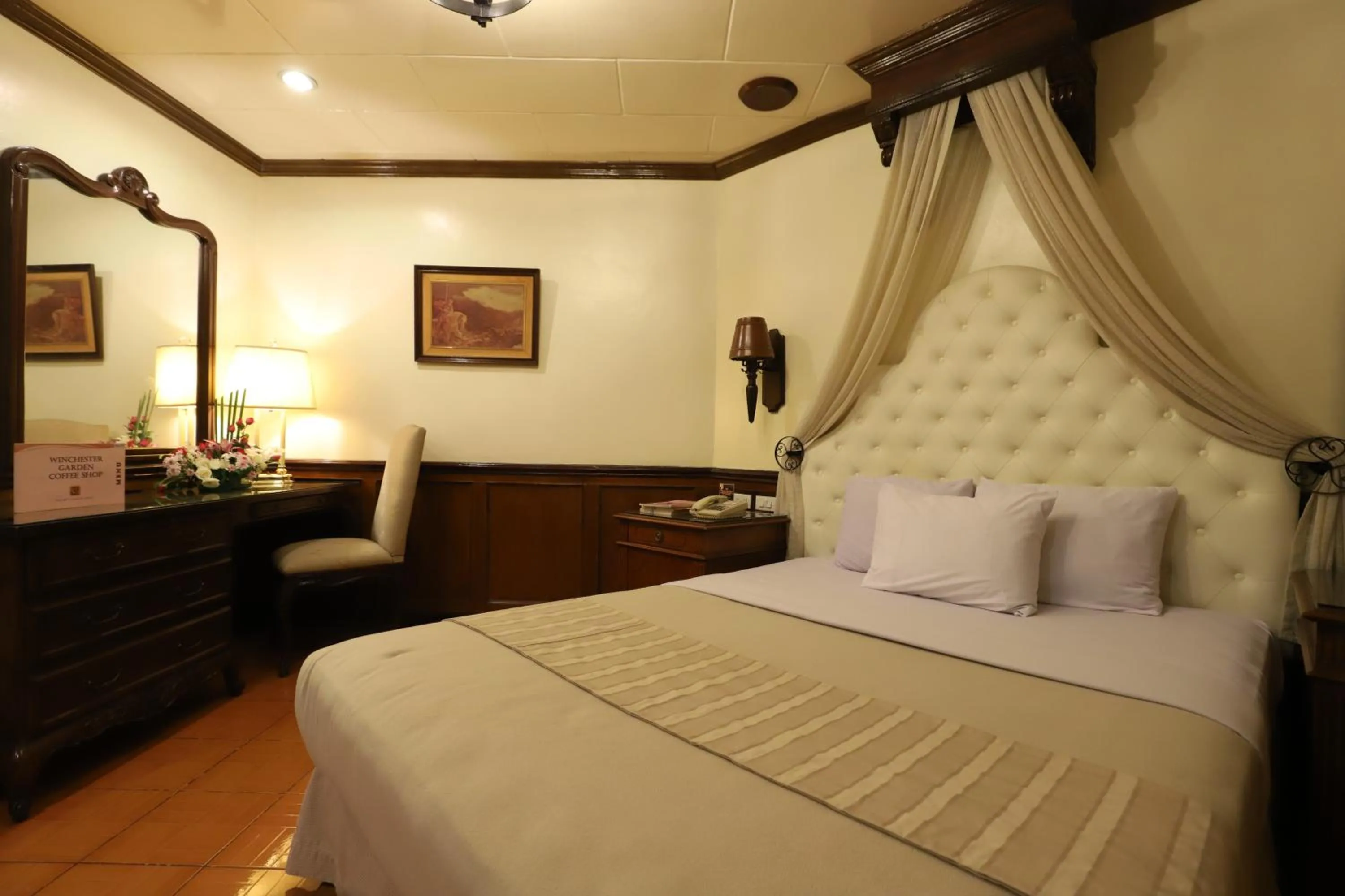 Bed in Camelot Hotel