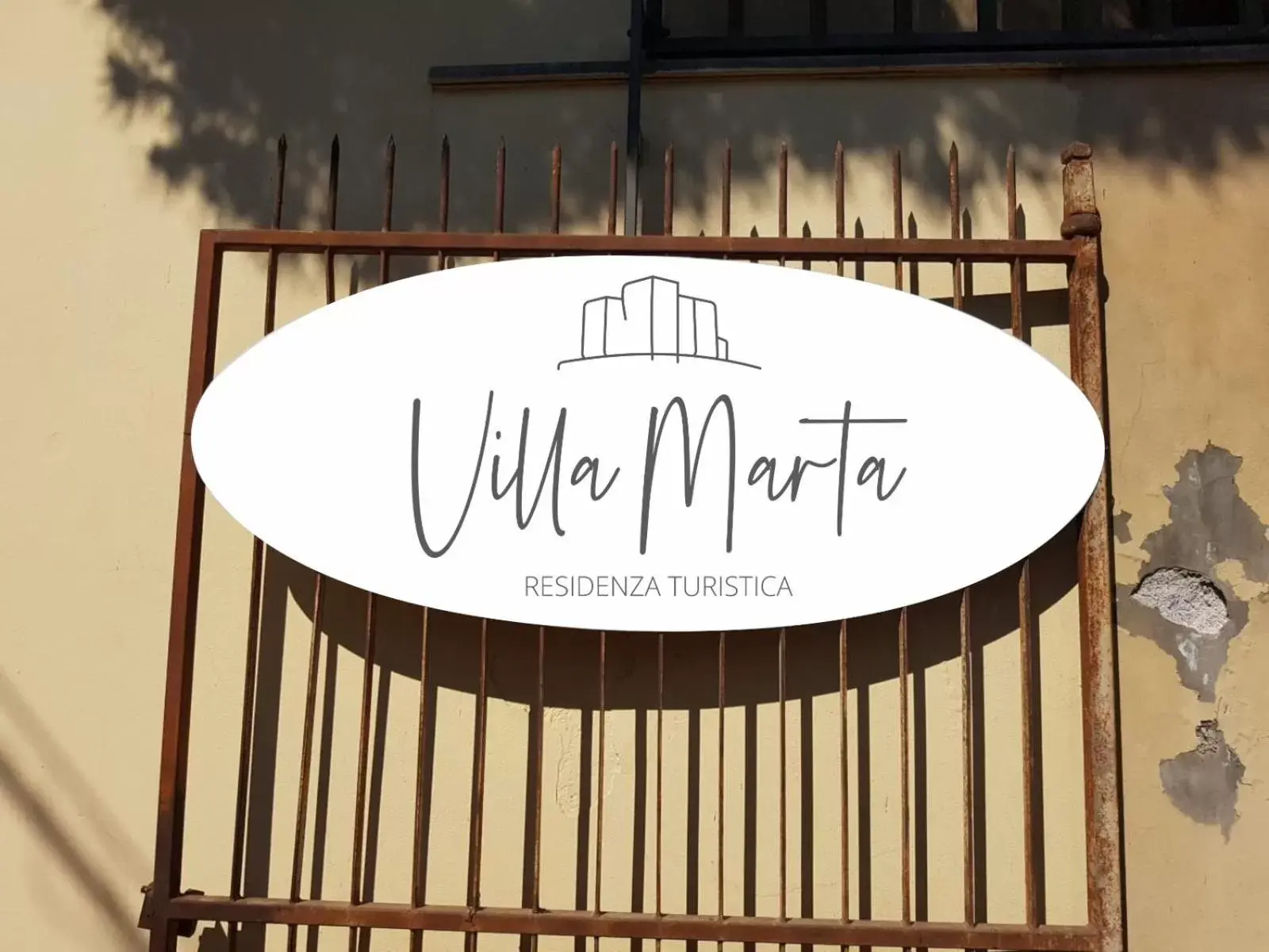 Property logo or sign in VILLA MARTA a due passi dalla clinica ortopedica Rizzoli e da Villa Santa Teresa