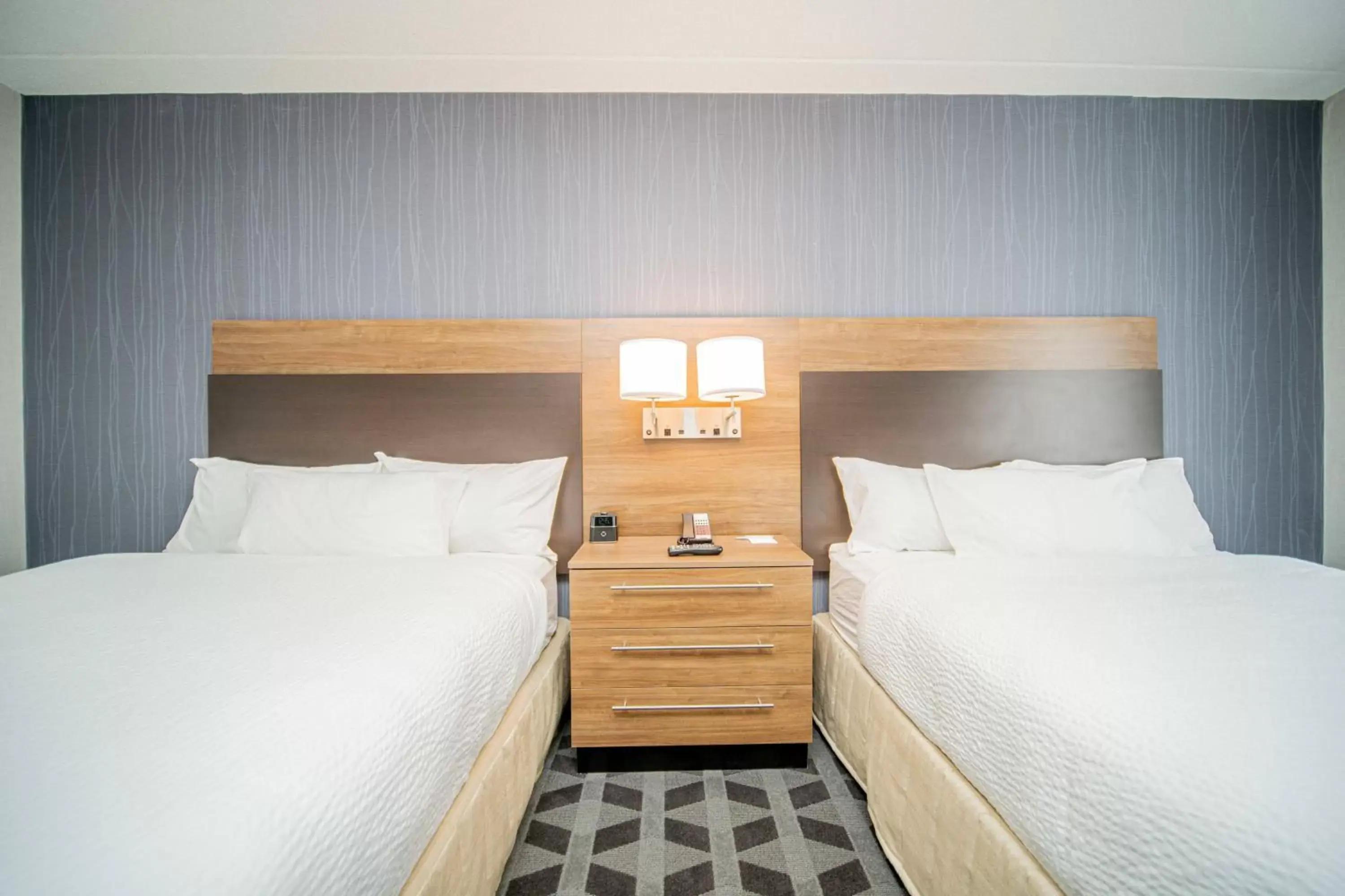 Bedroom, Bed in TownePlace Suites by Marriott Brantford and Conference Centre