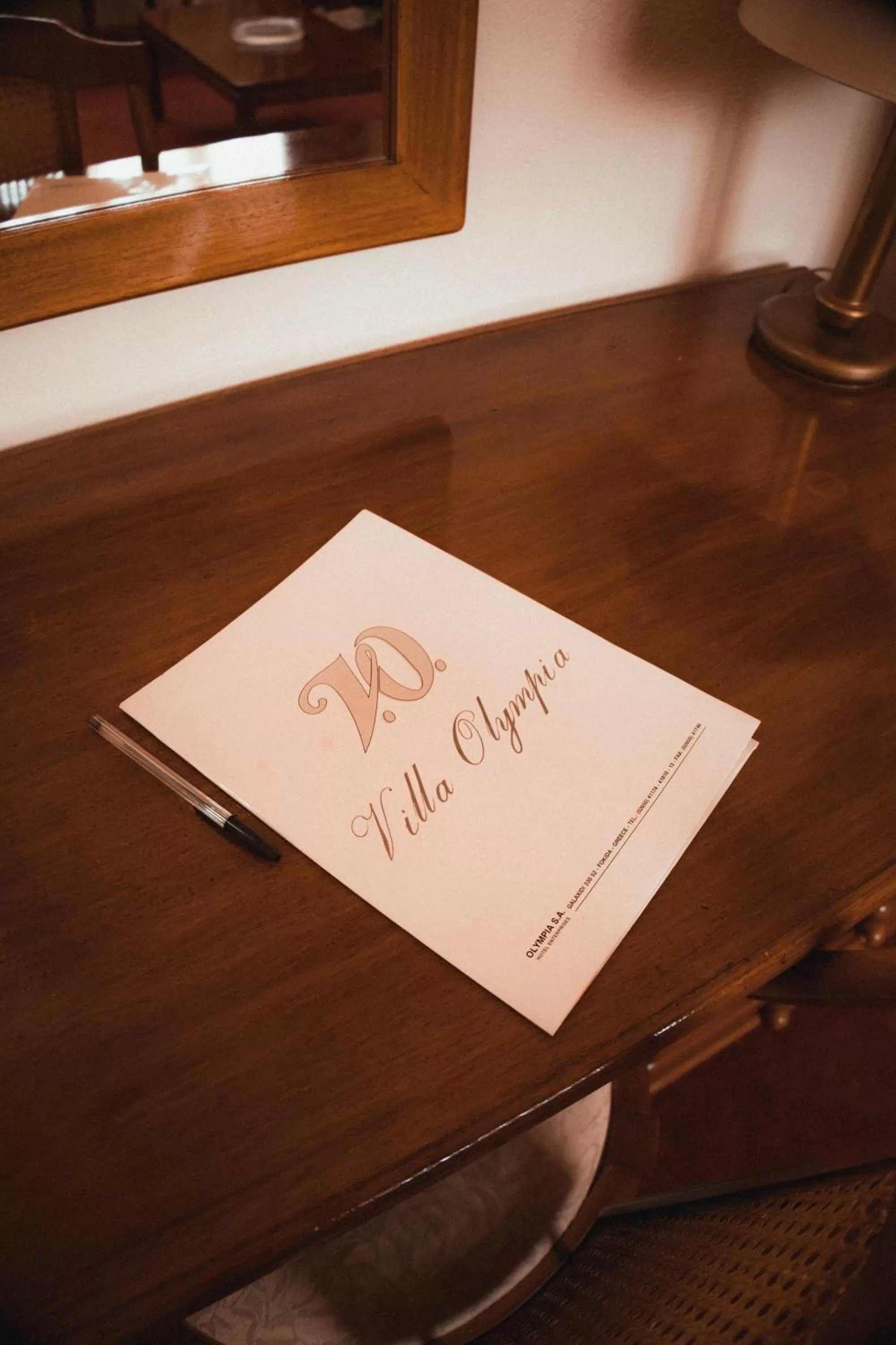 Property logo or sign in Villa Olympia