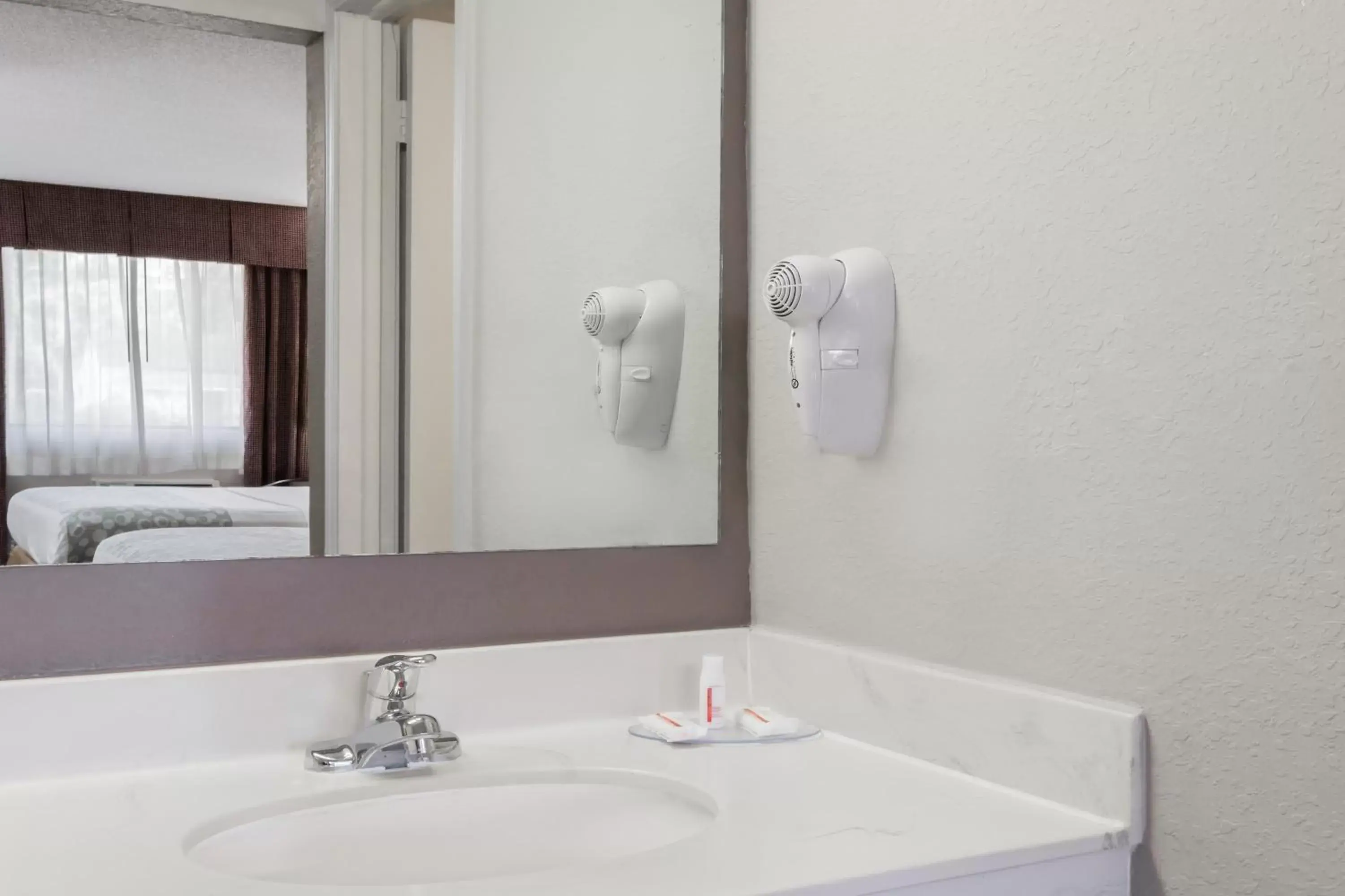 Bathroom in Days Inn by Wyndham St Augustine/Historic Downtown